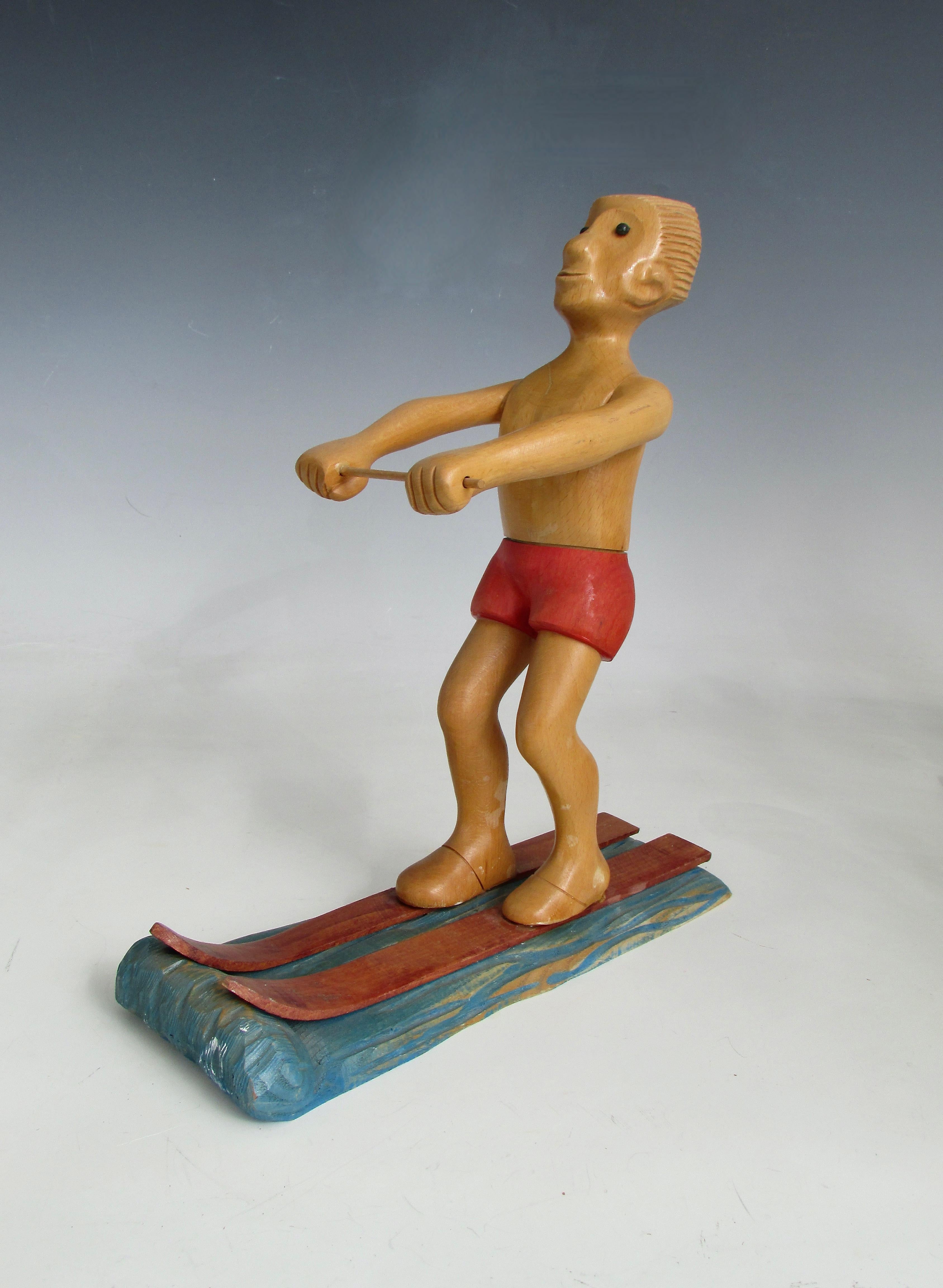 Romer Italia escultura de sobremesa tallada a mano de esquiador acuático Tallado a mano en venta