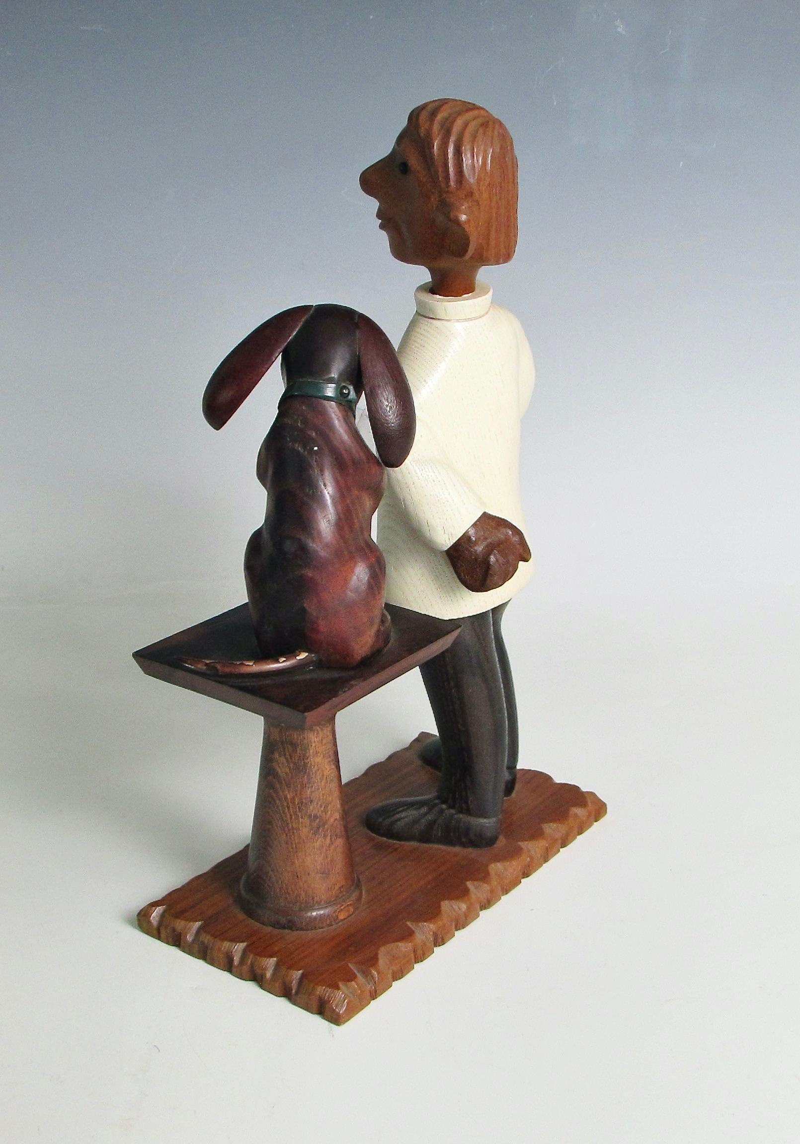 Sculpté à la main Romer Italie, sculptée à la main, sculpture d'un vétérinaire avec un patient chiot en vente