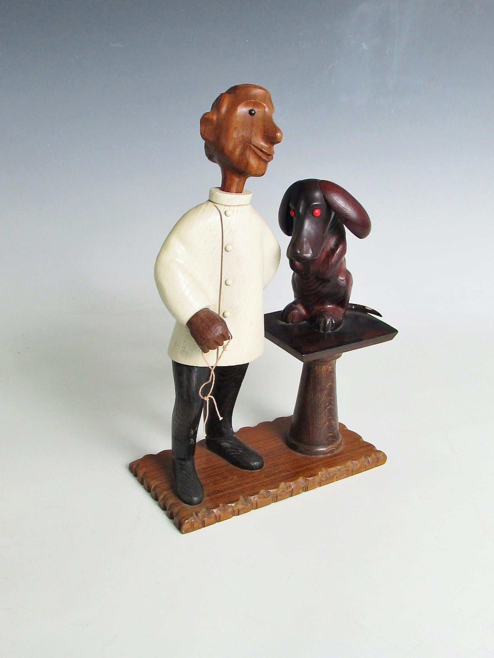 Romer Italie, sculptée à la main, sculpture d'un vétérinaire avec un patient chiot en vente 1
