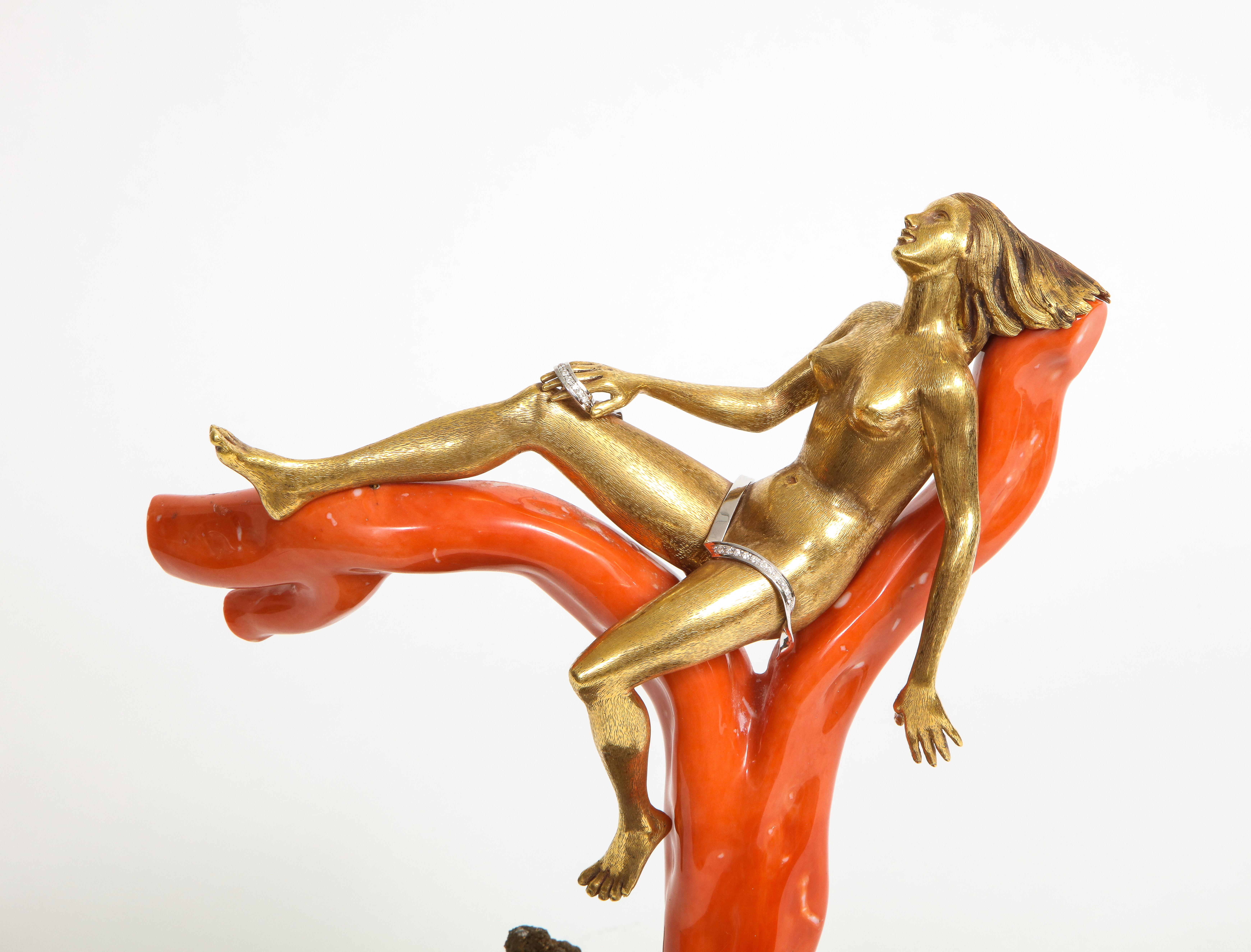 Gold & coral resting lady object by Romolo Grassi
The lady is 18k yellow gold on one very fine solid coral.
Accented with diamonds and mounted on quartz
Gold gram weight: 766.7 grams
Coral gram weight: 877.3 grams
Measurements: approximately