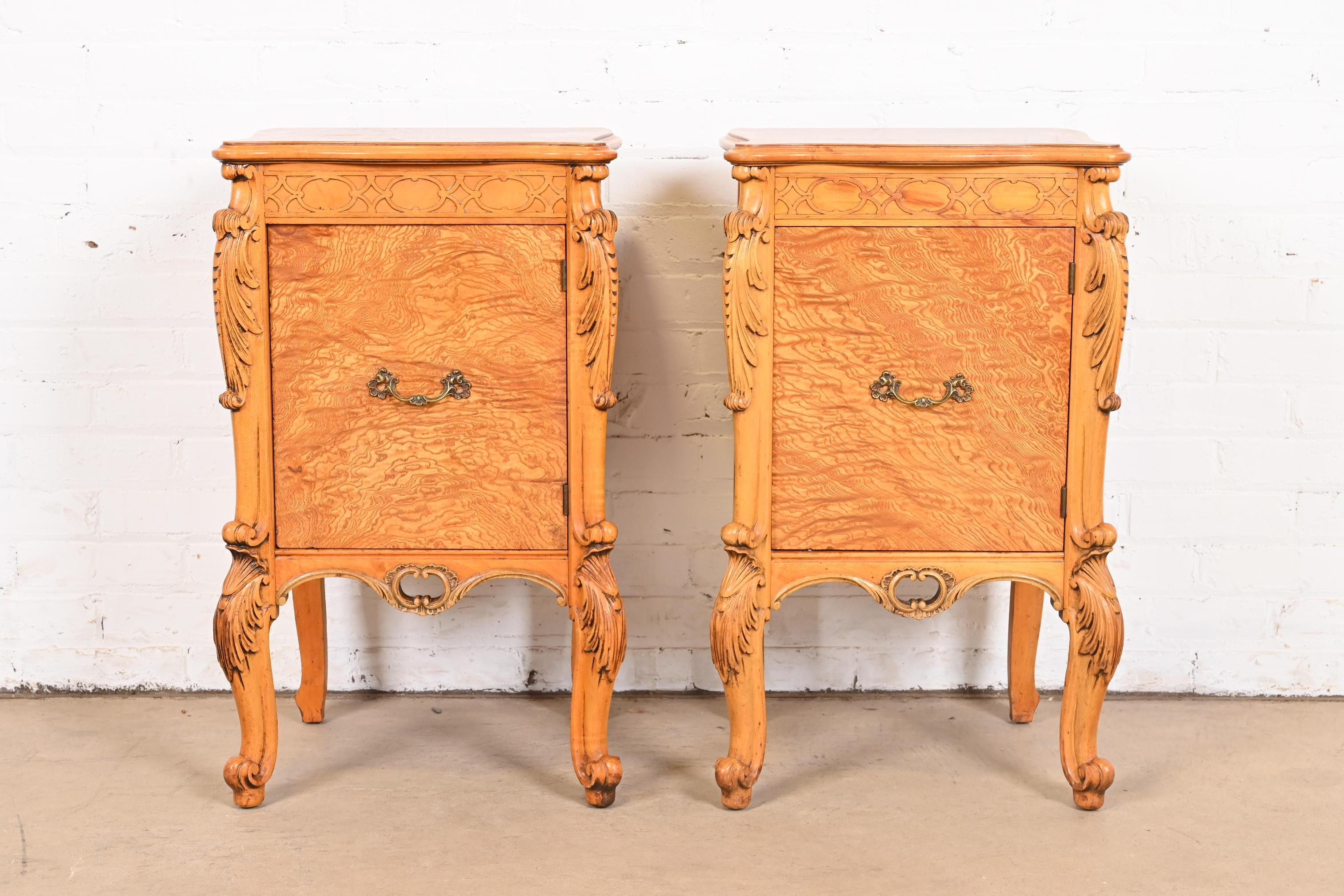 An exceptional pair of French Provincial Louis XV style nightstands

By Romweber

USA, Circa 1920s

Stunning exotic burled Narra wood, with carved cabriole legs, and original brass hardware.

Measures: 17.5