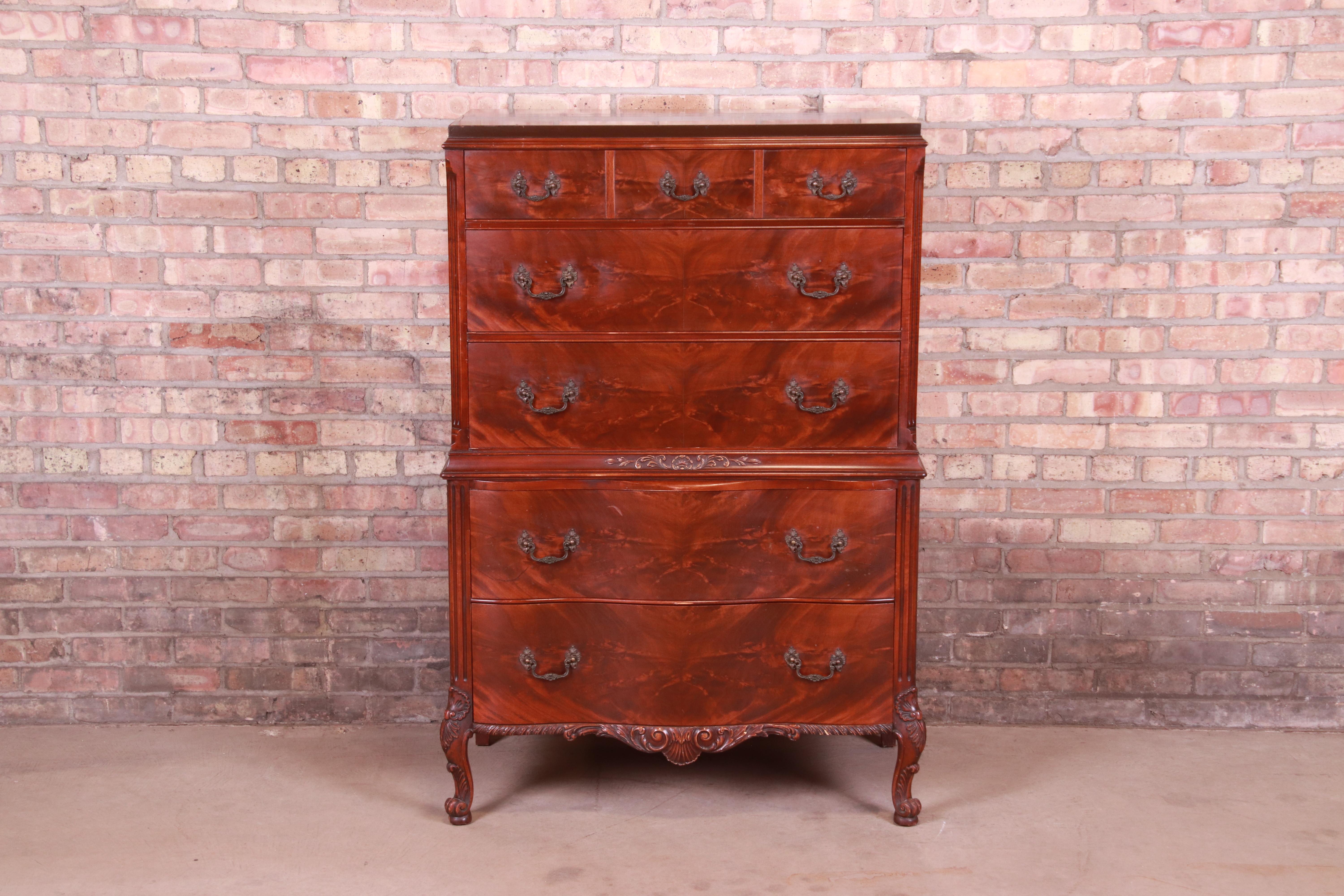 A gorgeous French Provincial Louis XV style five-drawer highboy dresser

By Romweber

USA, Circa 1920s

Burled mahogany, with original brass hardware.

Measures: 37