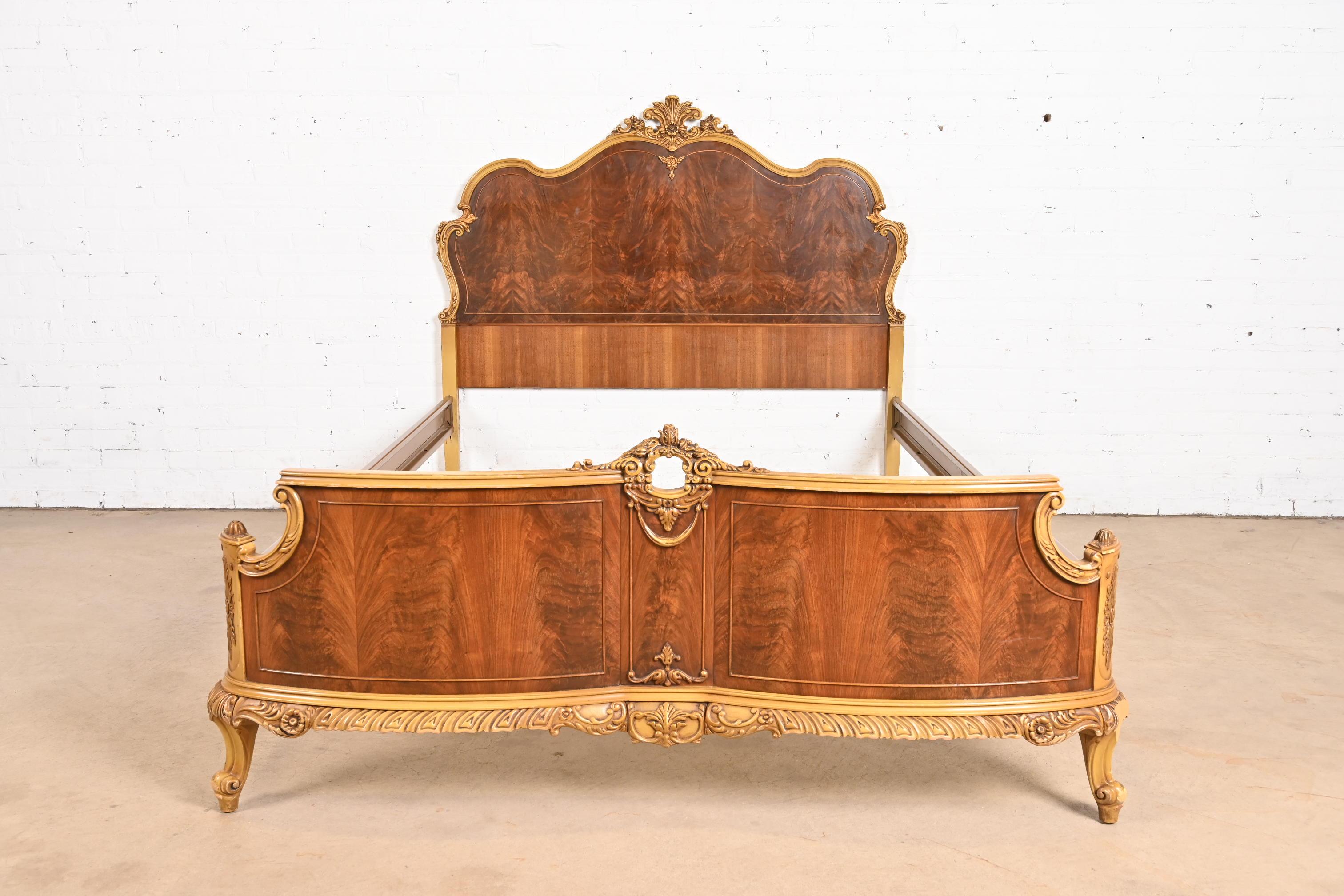 A gorgeous French Rococo or French Provincial Louis XV style full size bed frame

By Romweber

USA, Circa 1920s

Beautiful flame mahogany, with ornate carved painted trim and legs.

Measures: 59