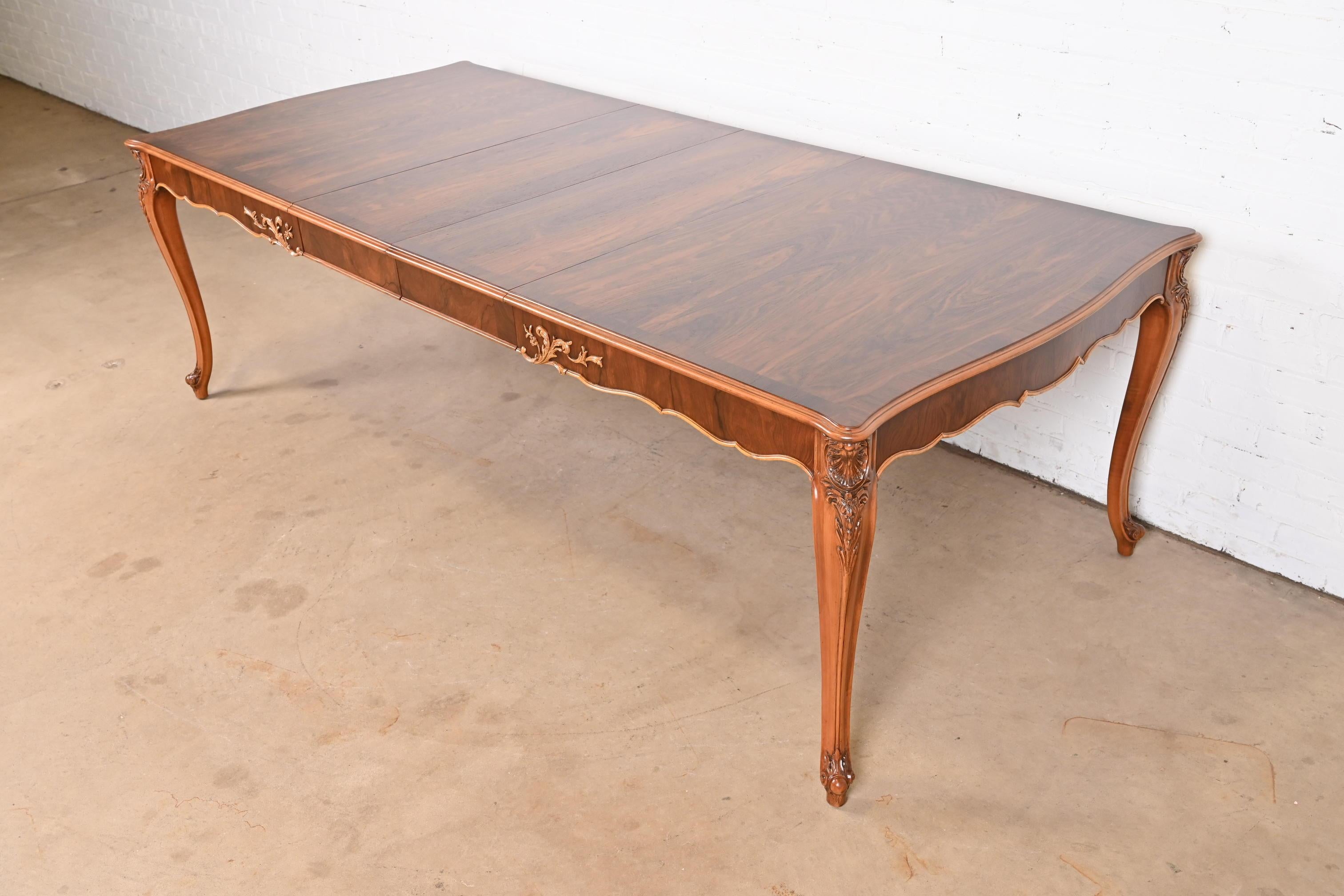 A gorgeous French Provincial Louis XV style extension dining table

By Romweber

USA, Circa 1920s

Stunning book-matched rosewood, with carved cabriole legs.

Measures: 68.5