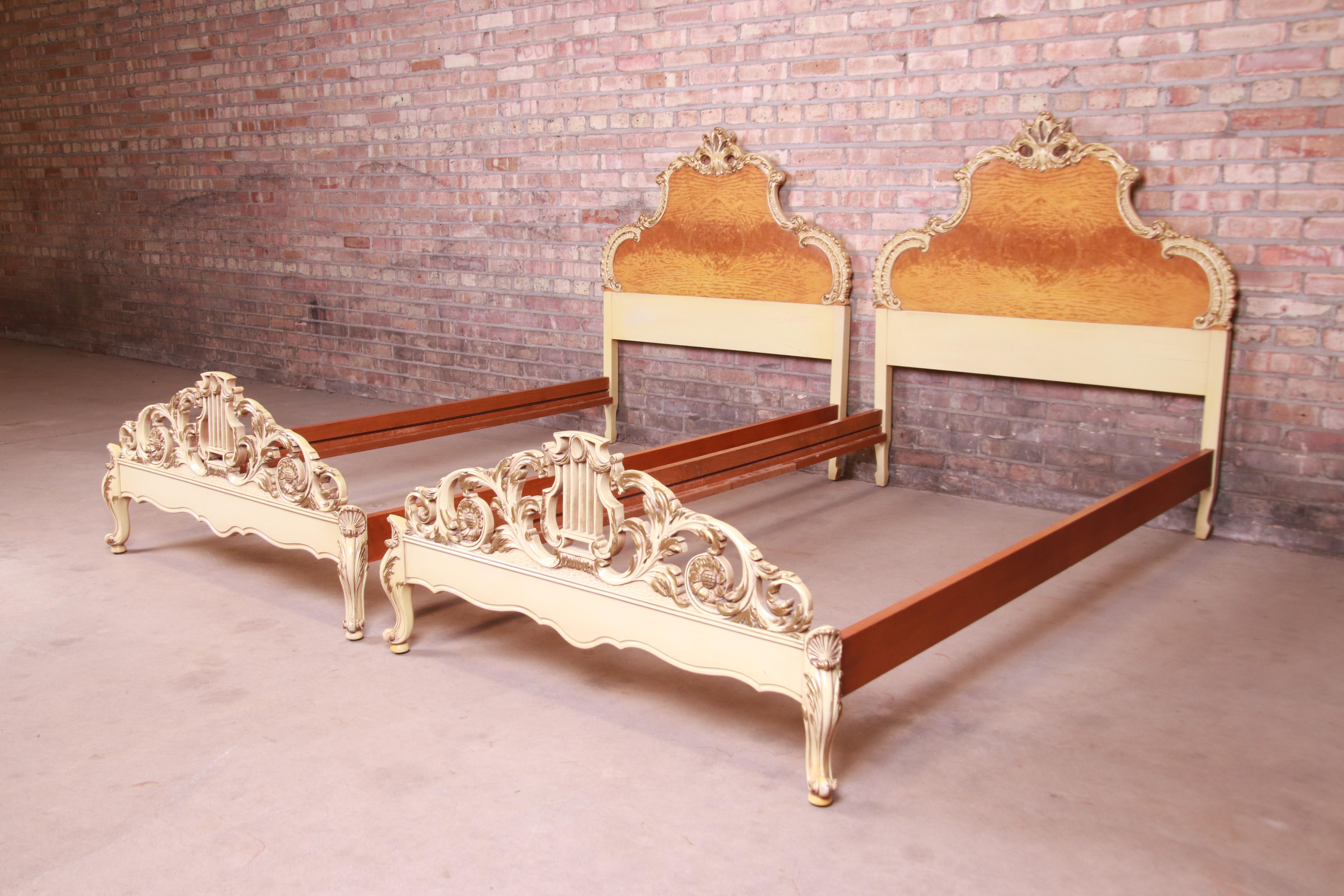 A gorgeous pair of French Rococo Louis XV style twin beds

By Romweber

USA, Circa 1930s

Exotic burled African avodire wood, with paint and gilt details.

Measures: 42.75