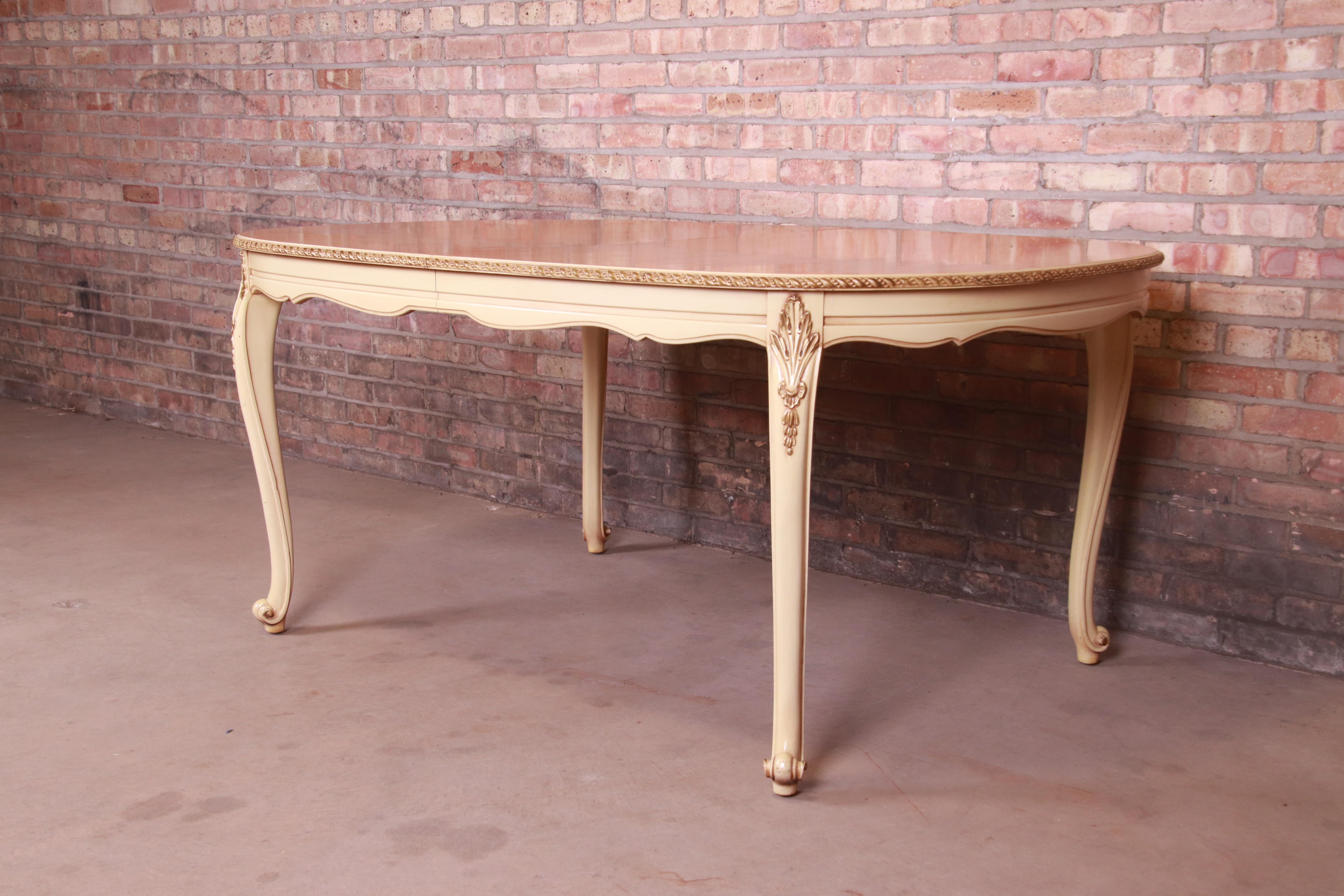 A gorgeous French Rococo Louis XV style extension dining table

By Romweber

USA, circa 1930s

Exotic African avodire wood top, with paint and gilt details.

Measures: 66