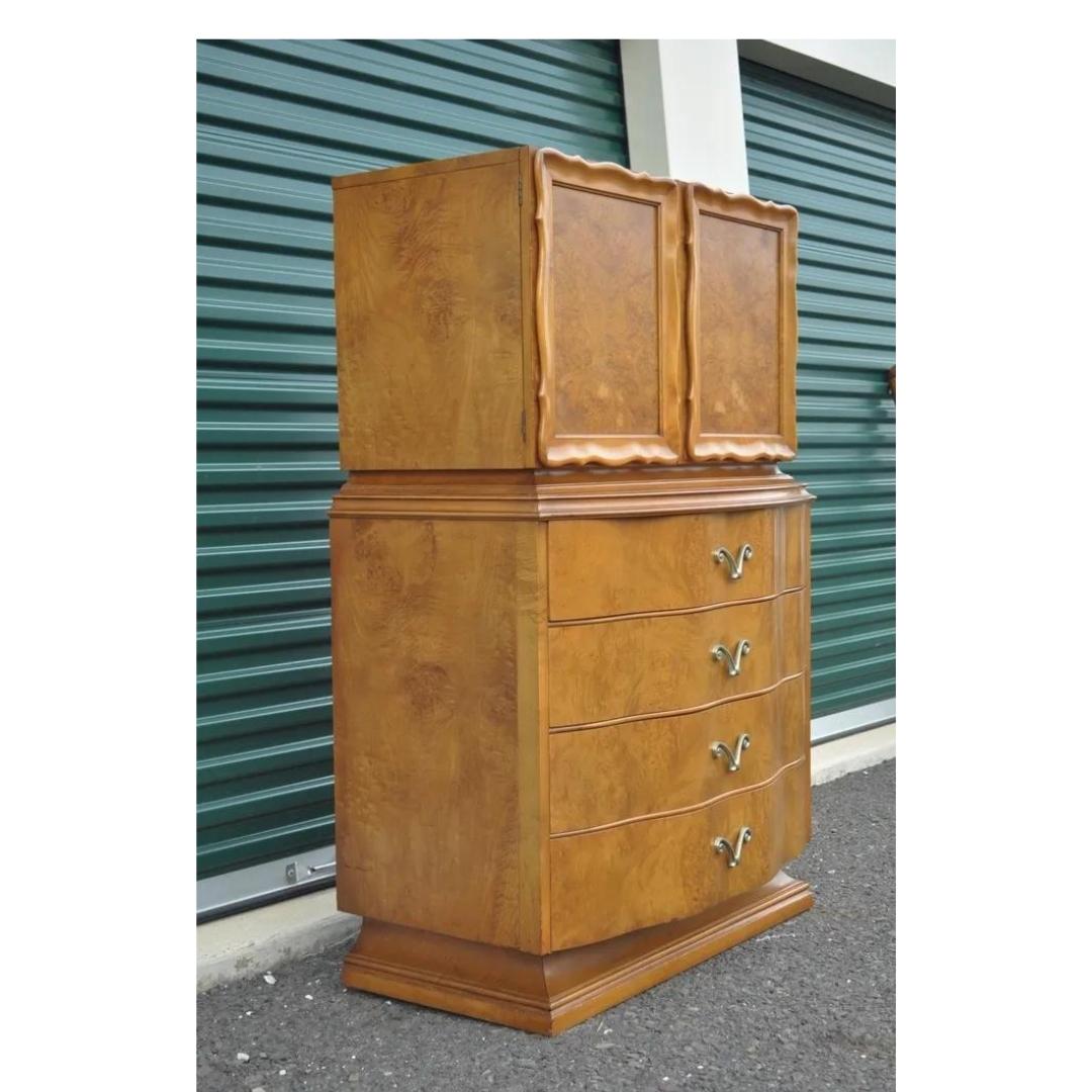 Romweber Hollywood Regency Dorothy Draper Style Burl Walnut Tall Chest Dresser.  Item features Shapely silhouette, 7 dovetailed drawers, unique sculptural drawer pulls, very nice vintage item. Circa Mid 20th Century. Measurements: 56.5