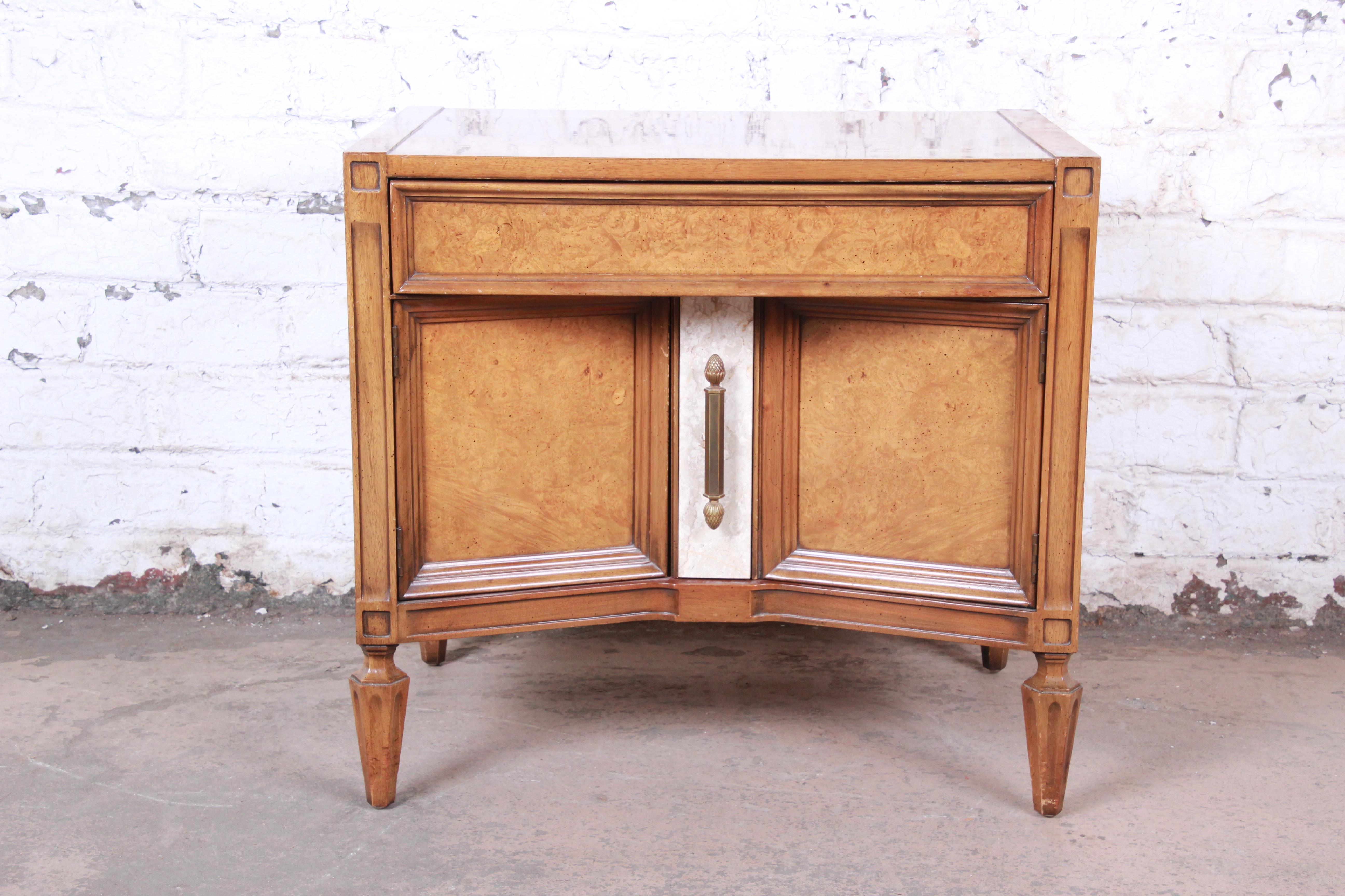 A gorgeous Mid-Century Modern Hollywood Regency nightstand or end table from the 
