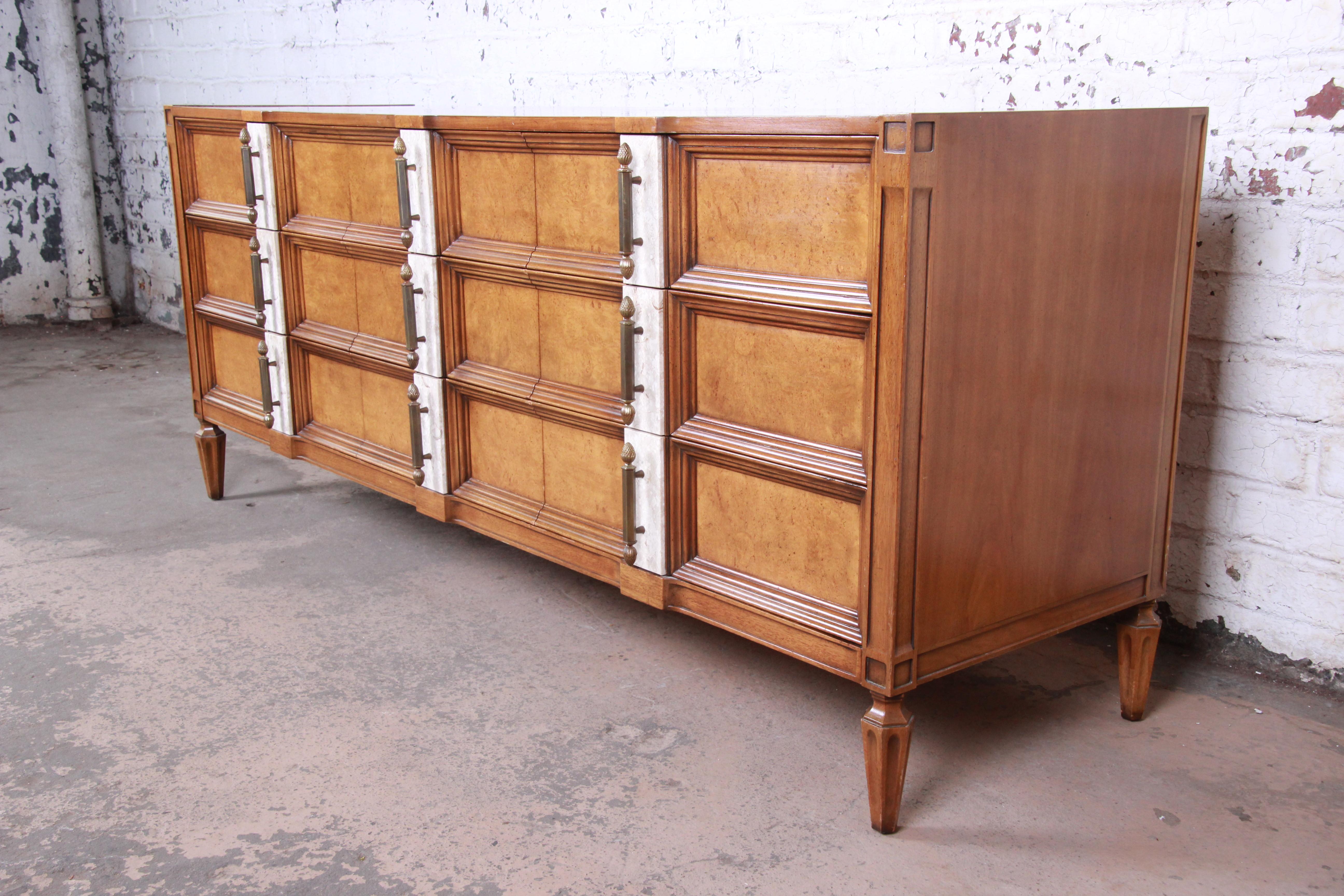 A gorgeous Mid-Century Modern Hollywood Regency triple dresser or credenza from the 
