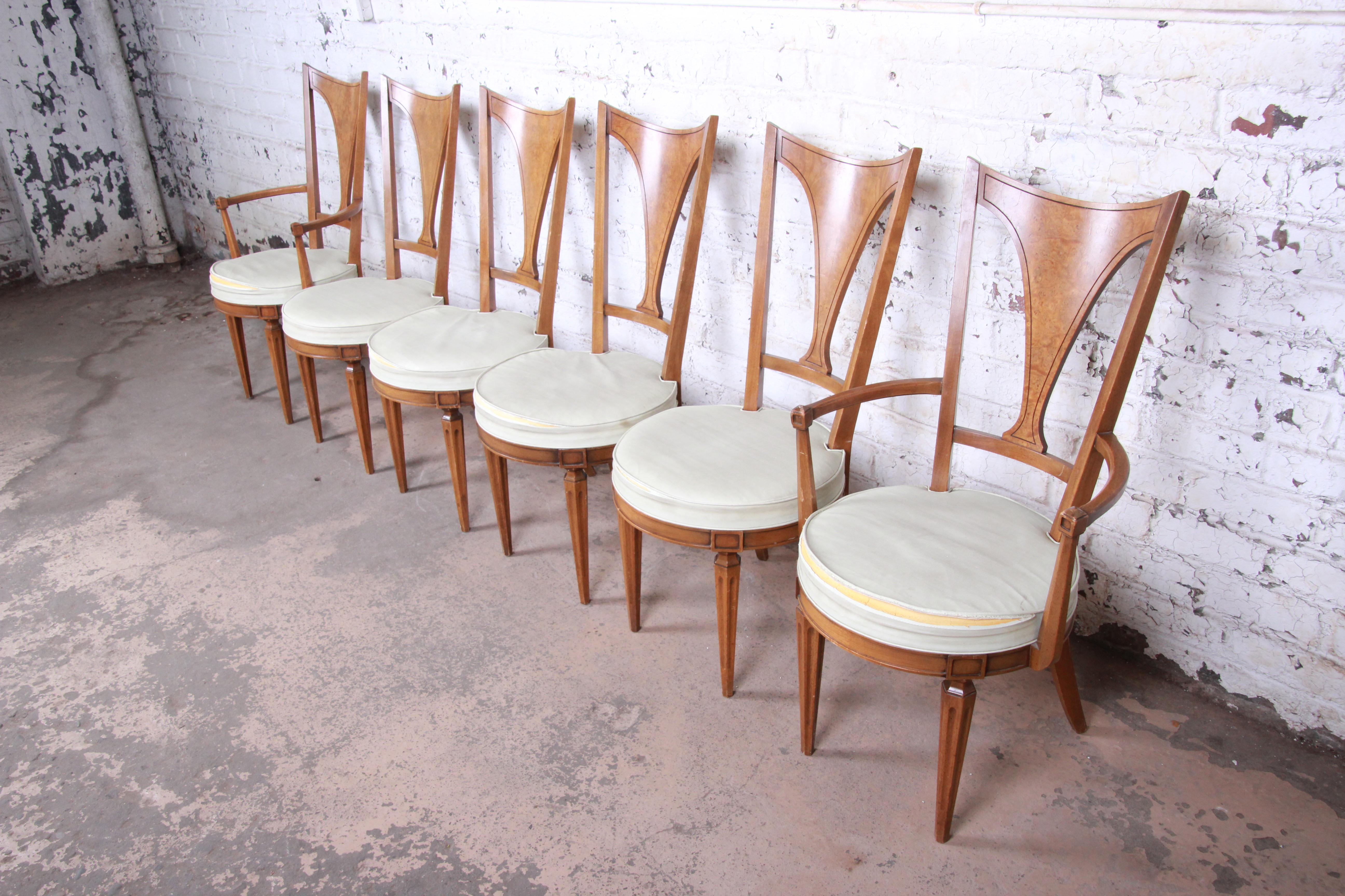 A gorgeous set of six Mid-Century Modern V-back dining chairs from the 