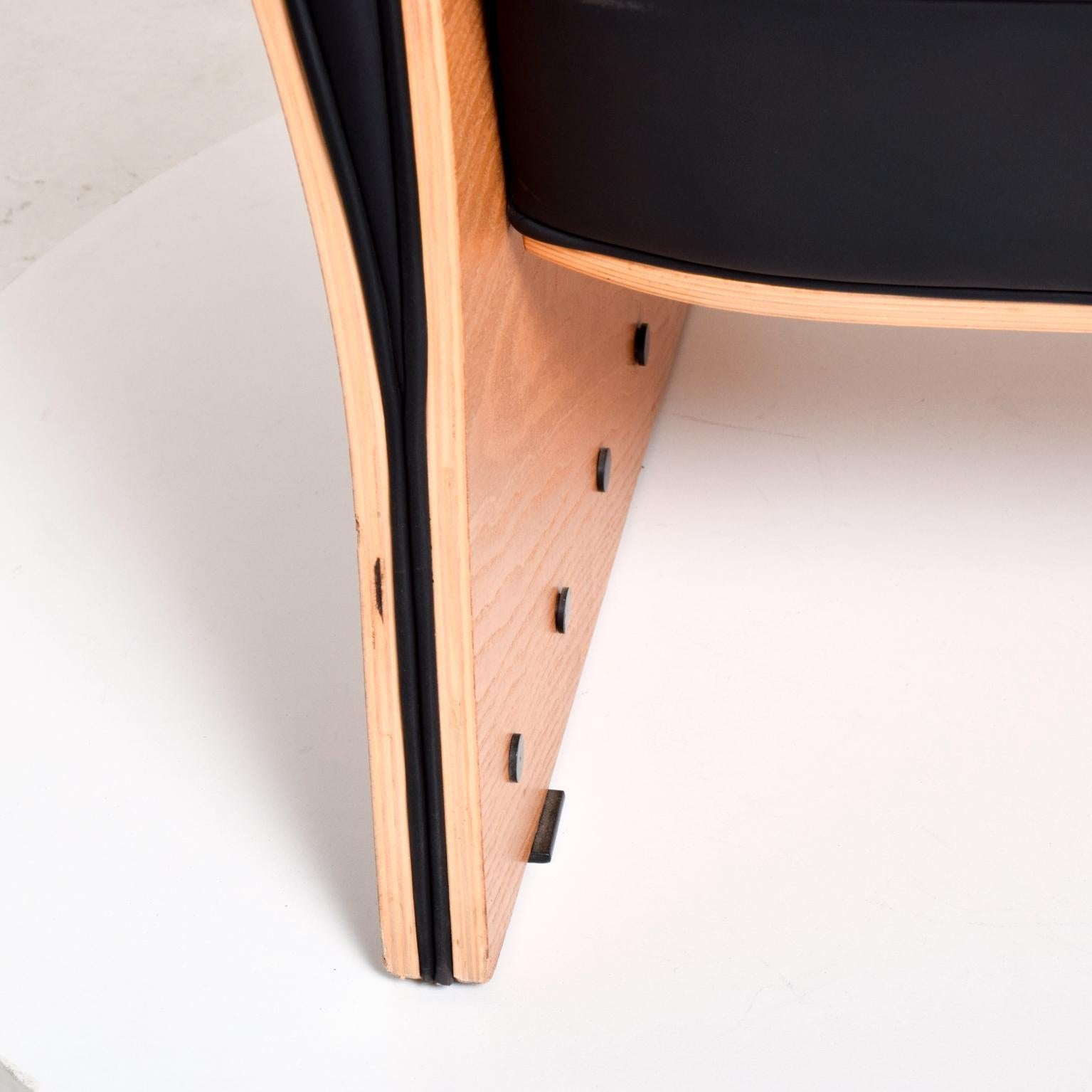 For your consideration, a one of a kind, a rare chair designed by British design Ron Arad. Don miss out the opportunity to add to your collection this rare chair. Bent birch plywood with original black Naugahyde and original screws. No label present