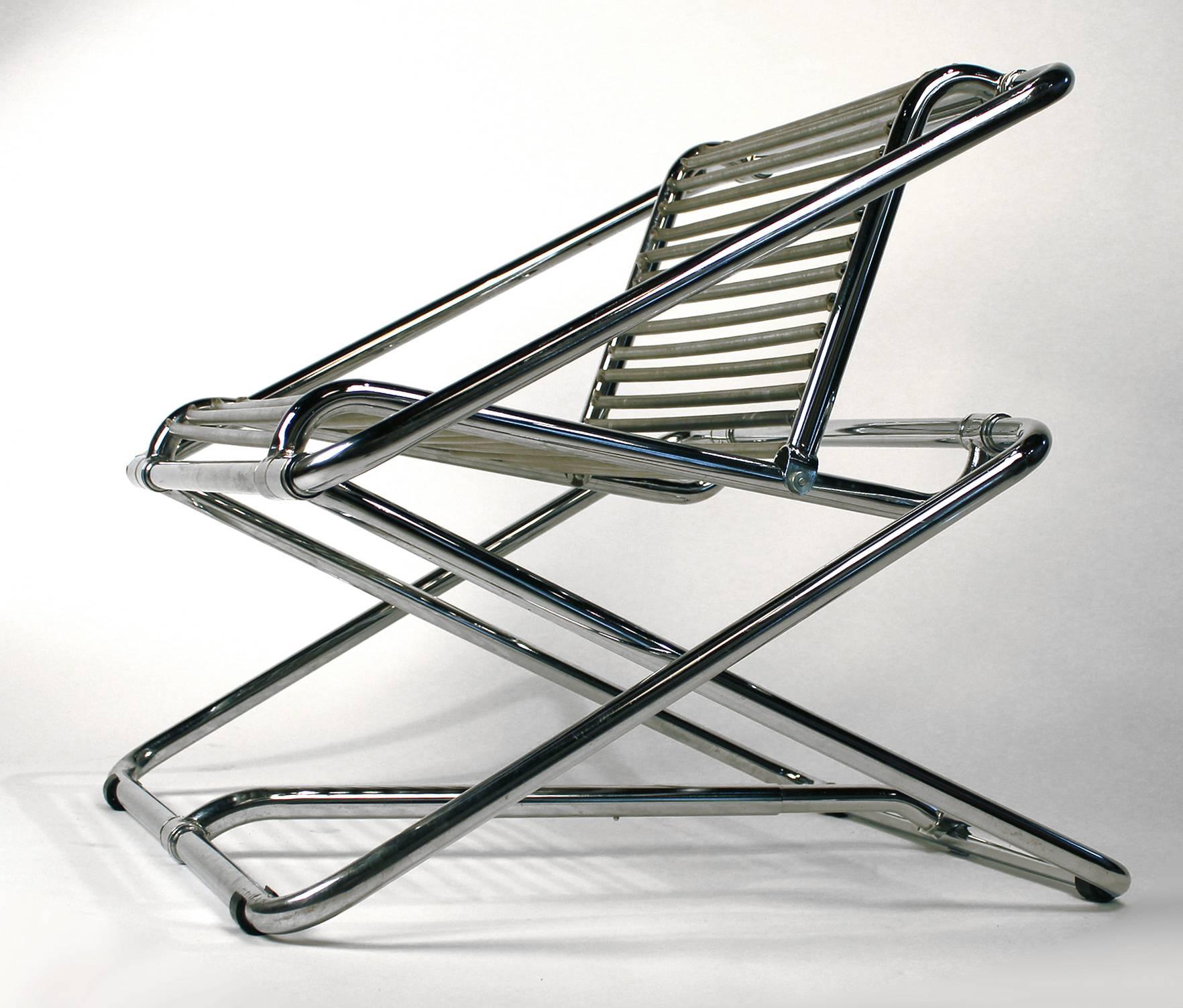 A rare chrome-plated bent tubular steel rocking chair with PVC-covered galvanized springs. Manufactured by One Off, Ltd., UK. From a series of approximately 70.