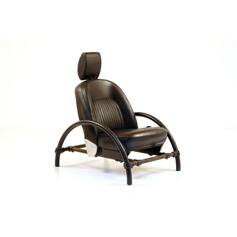 Reclining armchair rover chair by Ron Arad 1981. Oneoff Edition seat redone by Tapissier. New foams new leather adjustable headrest.