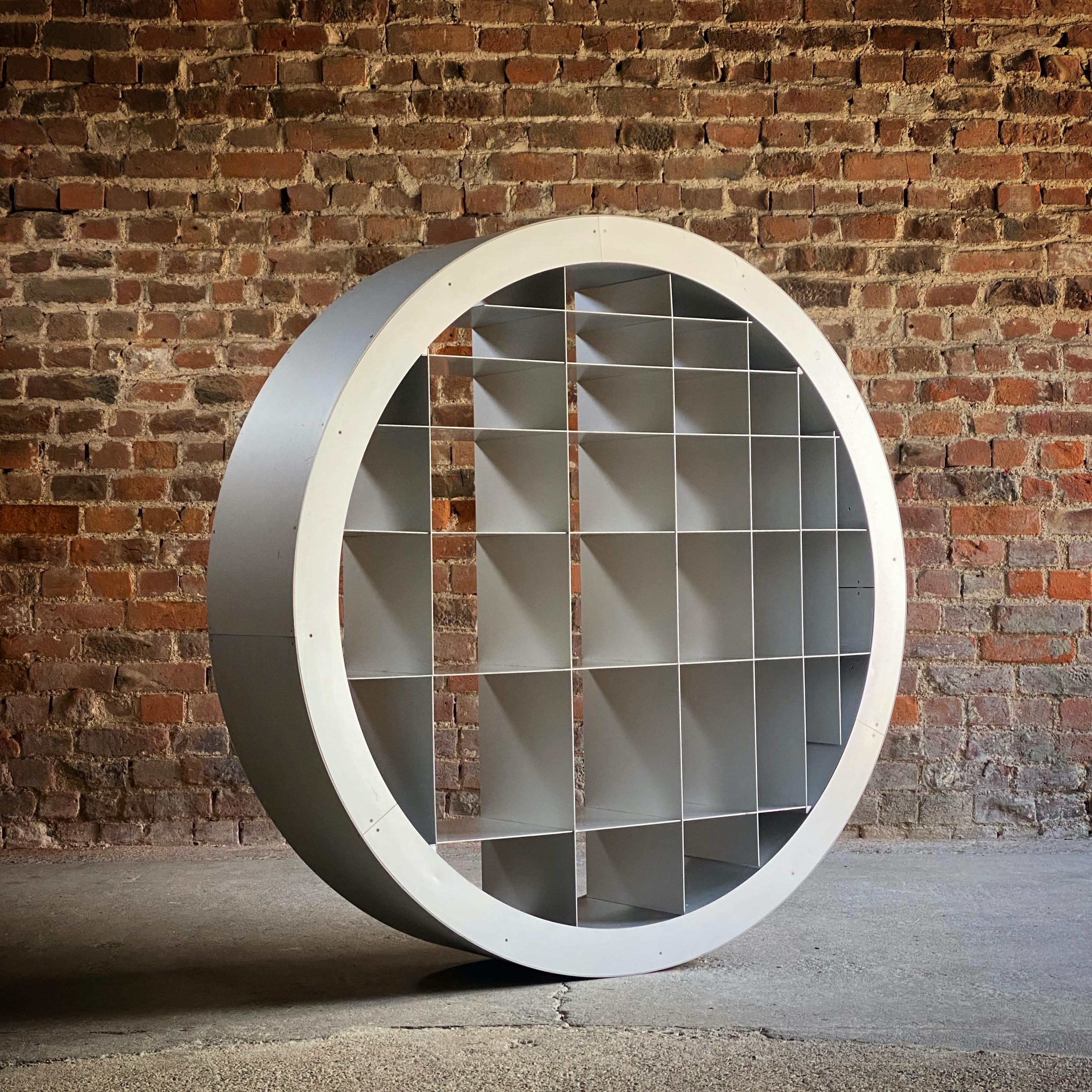 Ron Arad R.T.W. ‘Reinventing the Wheel' Bookcase by Hidden 2000

The R.T.W. or ‘Reinventing the Wheel' was designed by Ron Arad in 1996, the anodised aluminium rotating circular bookcase has shelves that they will always remain in a horizontal