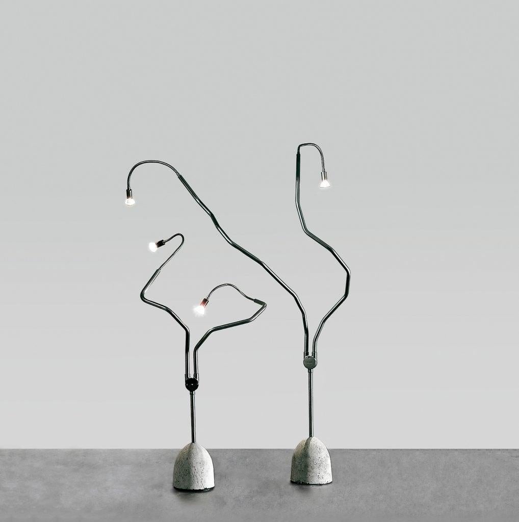 Two lamps model tree light design Ron Arad for Zeus Base.
Frame: Gunmetal color
Base: Concrete
Bulbs: 2 x 50 W - 12 V. Dimmer
Dimensions:
Diameter 24 in. x height 44 in. / diameter 24 in. x height 72 in.
Diameter 60 cm x height 110 cm /