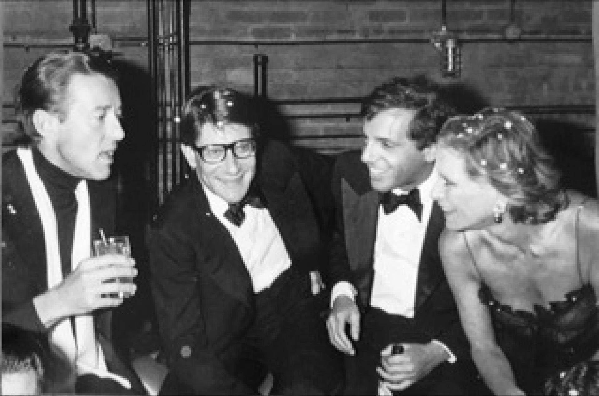 Ron Galella Black and White Photograph - Halston, Yves St. Laurent, Steve Rubell & Nan Kempner