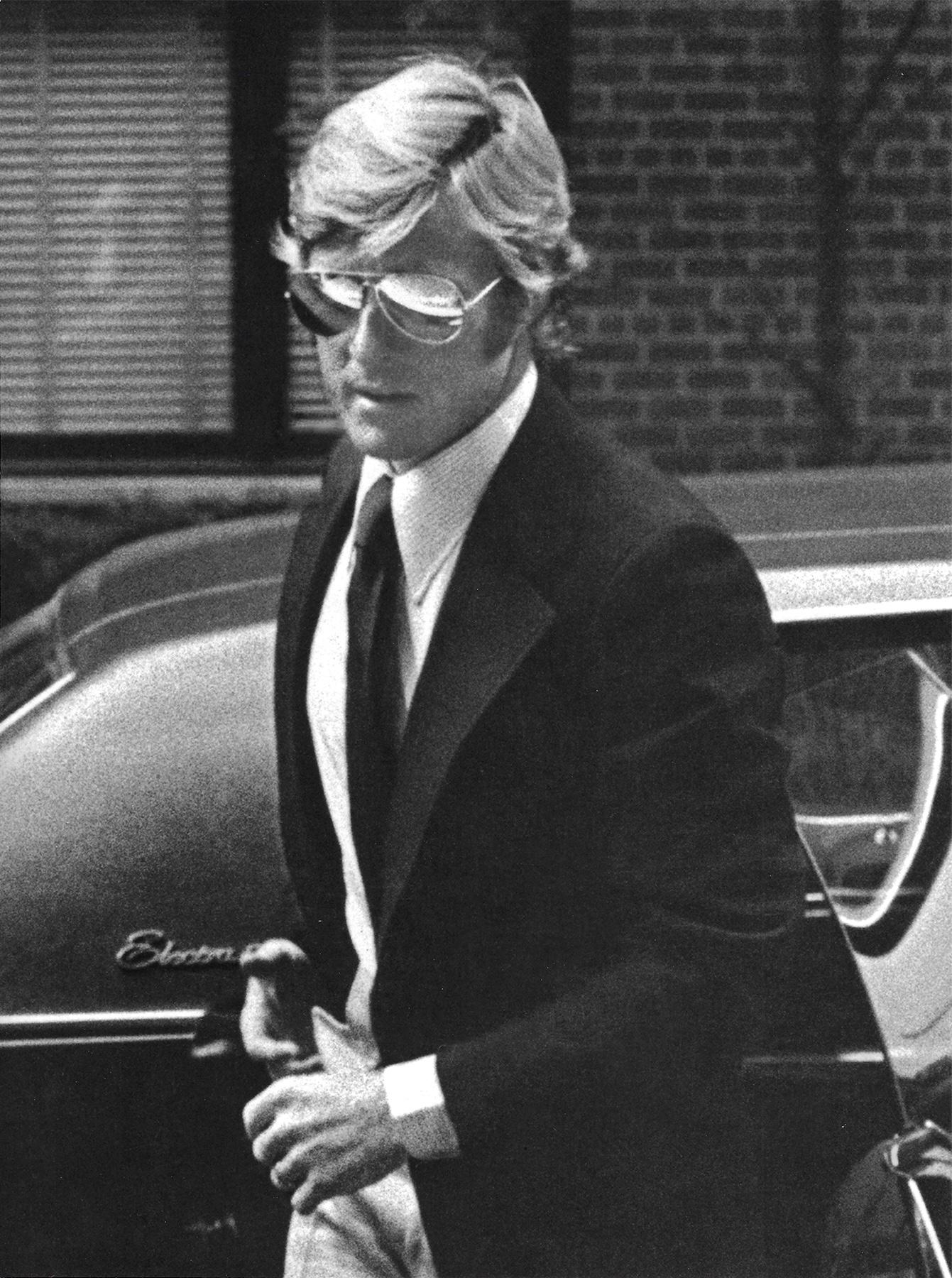 Robert Redford arriving at Mary Lasker's apartment, New York, 1974 - Photograph by Ron Galella