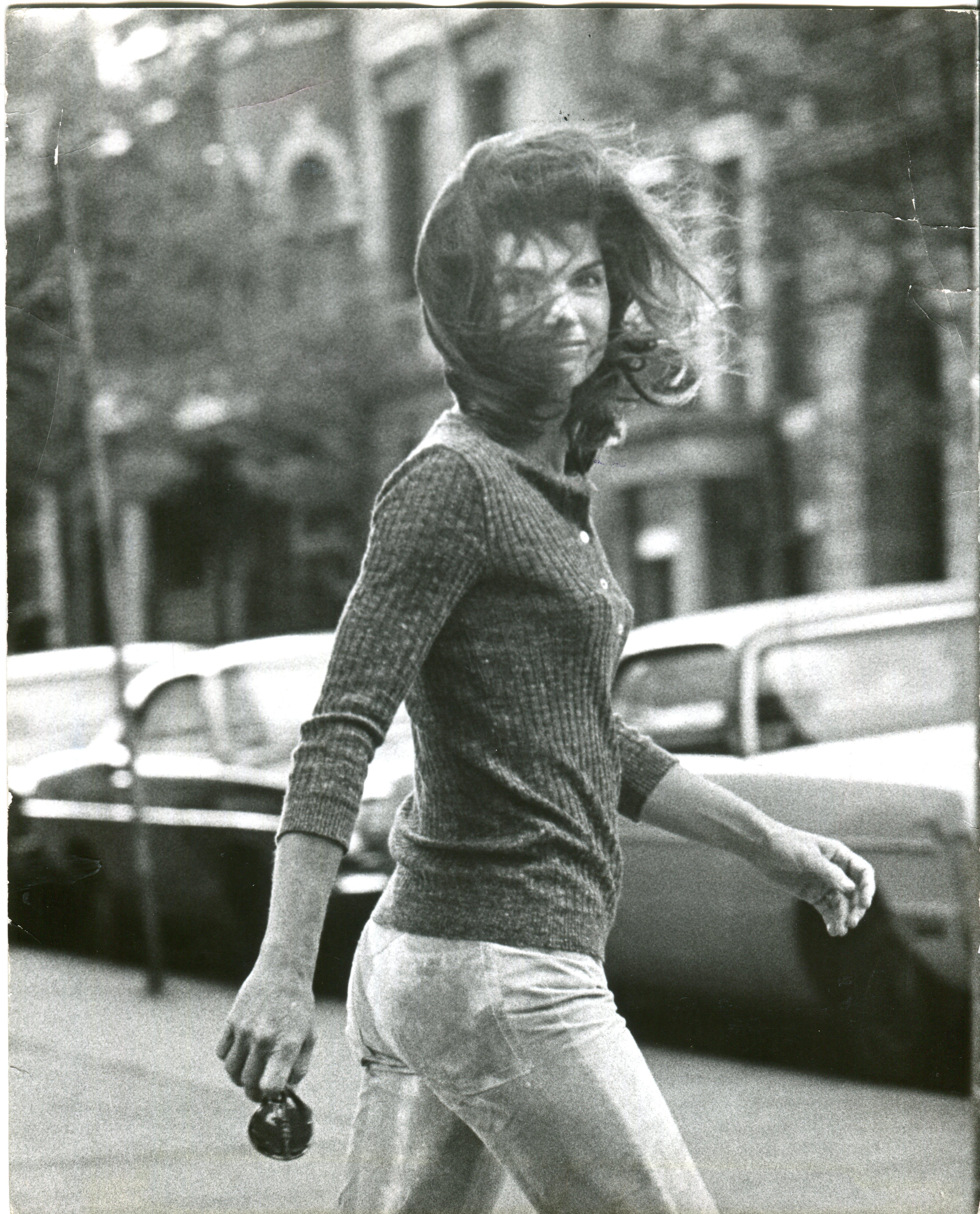 Ron Galella Black and White Photograph - Windblown Jackie 1971
