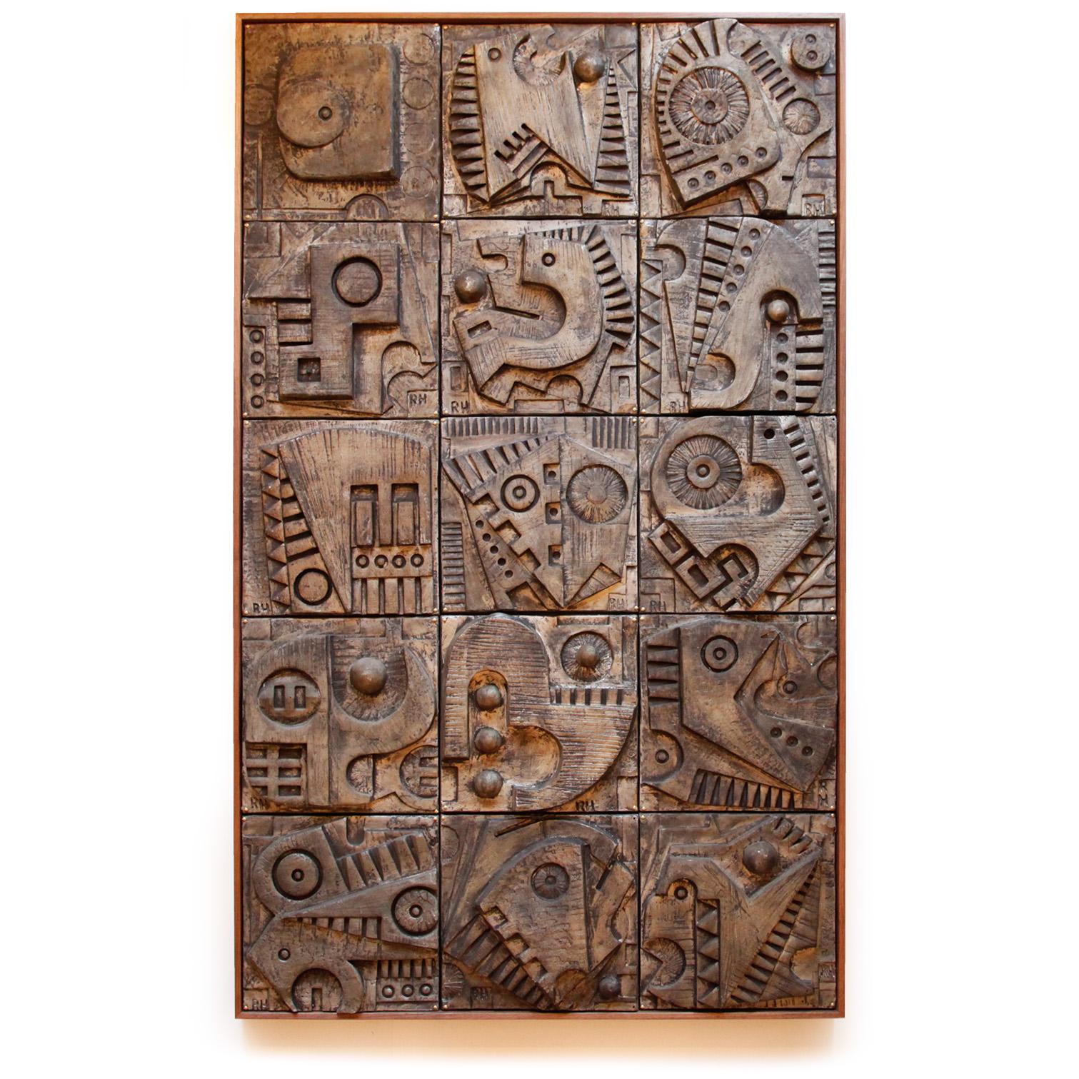 Monumental panel of 15 handmade fibreglass relief sculptures from the artist's own home. Each sculpture is signed and unique, with beautiful tarnished gold tones.

This very large, striking piece has a great Brutalist and Modernist feel. It is
