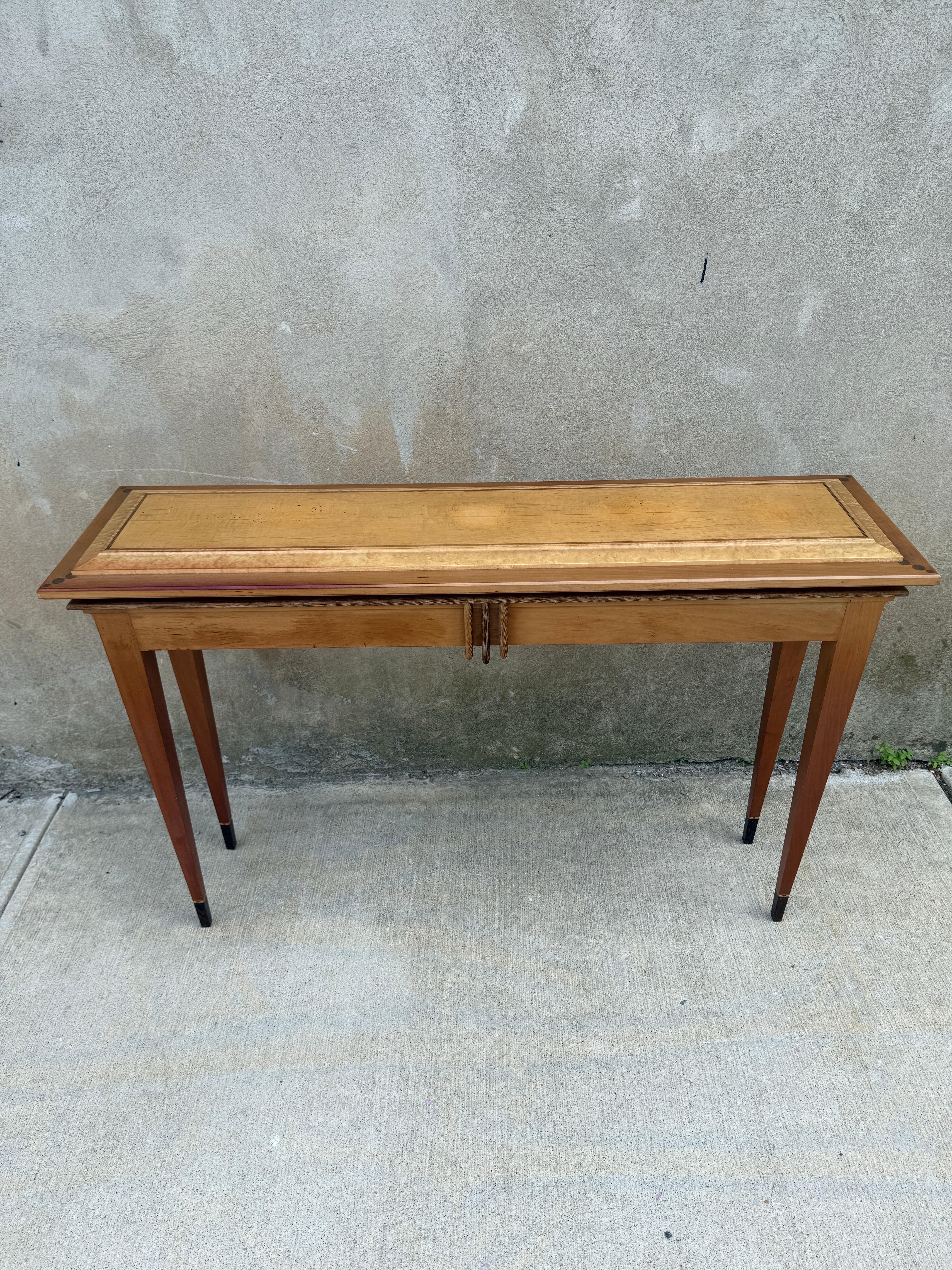 Amazing hand made Ron Puckett Custom Made Console Table NYC 1980’s, one of one, signed.  Expert craftsmanship and marquetry.  Consisting of painted maple, curly maple, and padouk.  Original purchase documentation available.  Expect some wear and