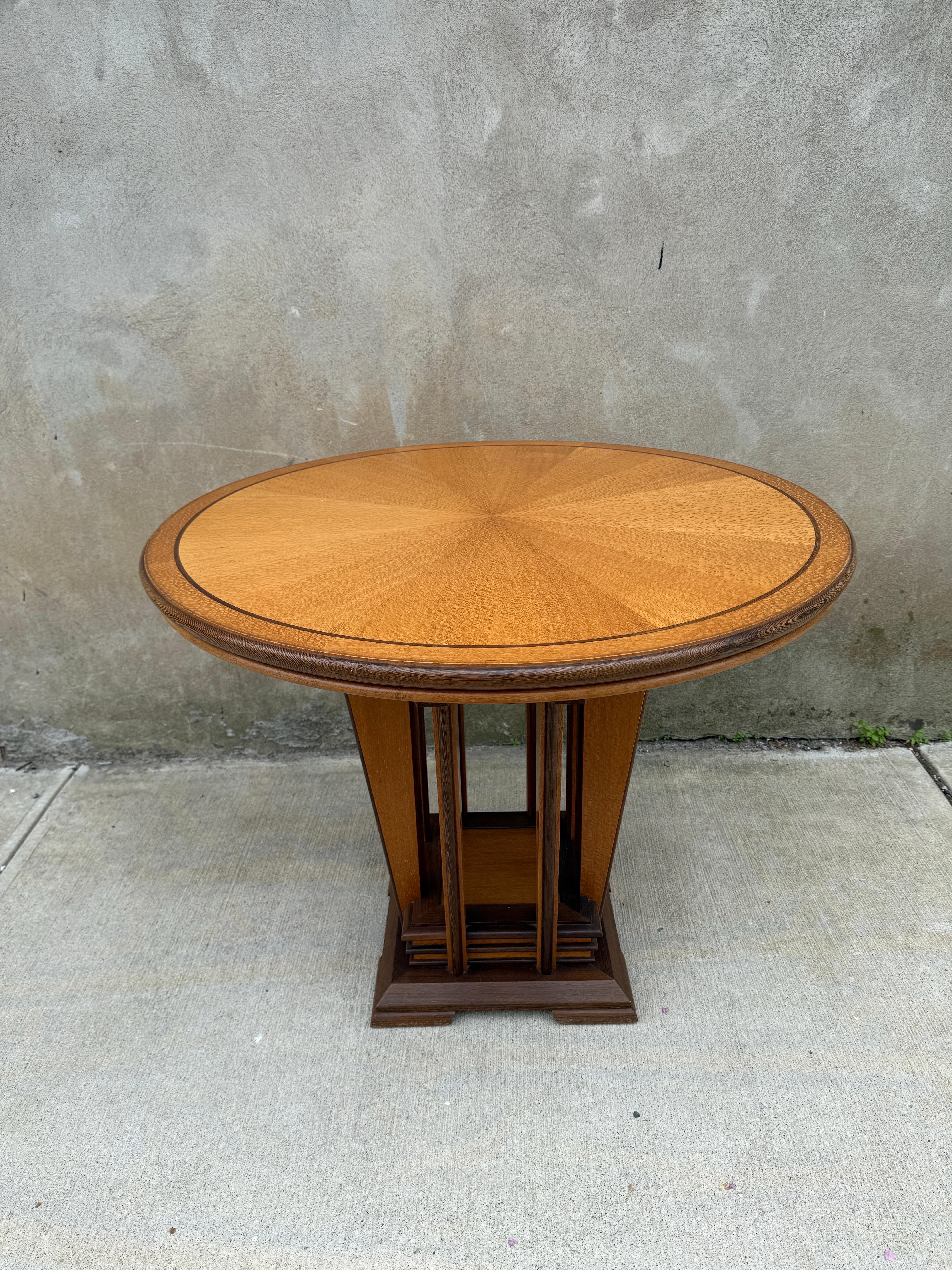 Amazing hand made Ron Puckett Custom Made Dining Table NYC 1980’s, one of one, signed. Expert craftsmanship and marquetry. Consisting of wenge and lacewood.  Original purchase documentation available.  Protective glass top available and included.