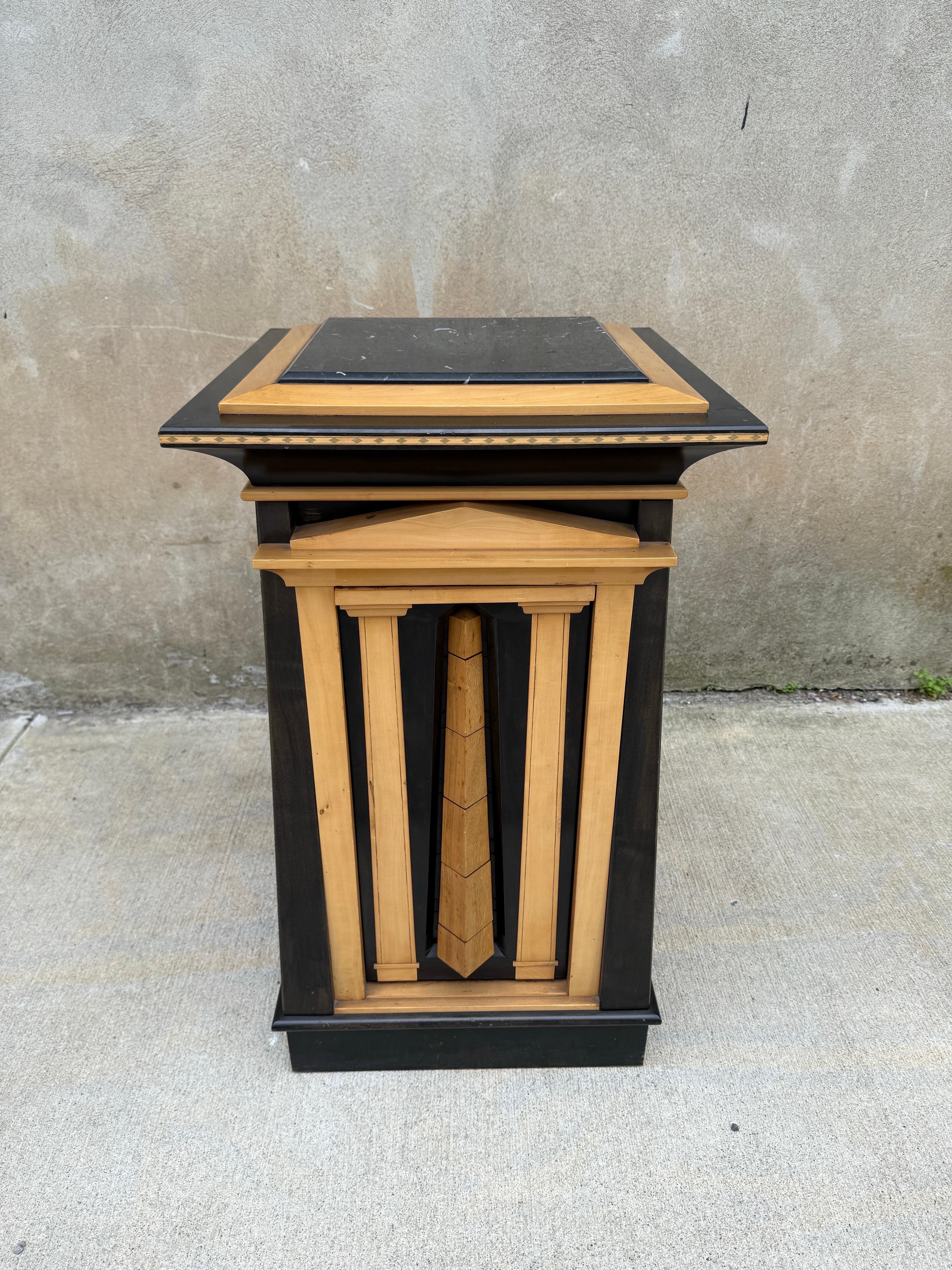Amazing hand made Pedestal Cabinet NYC 1980’s, one of one, signed. Expert craftsmanship and marquetry. Marble inset on top with one large crack.  Drop down front panel opens to reveal felt lined drawers. Consisting of pearwood, stained maple,