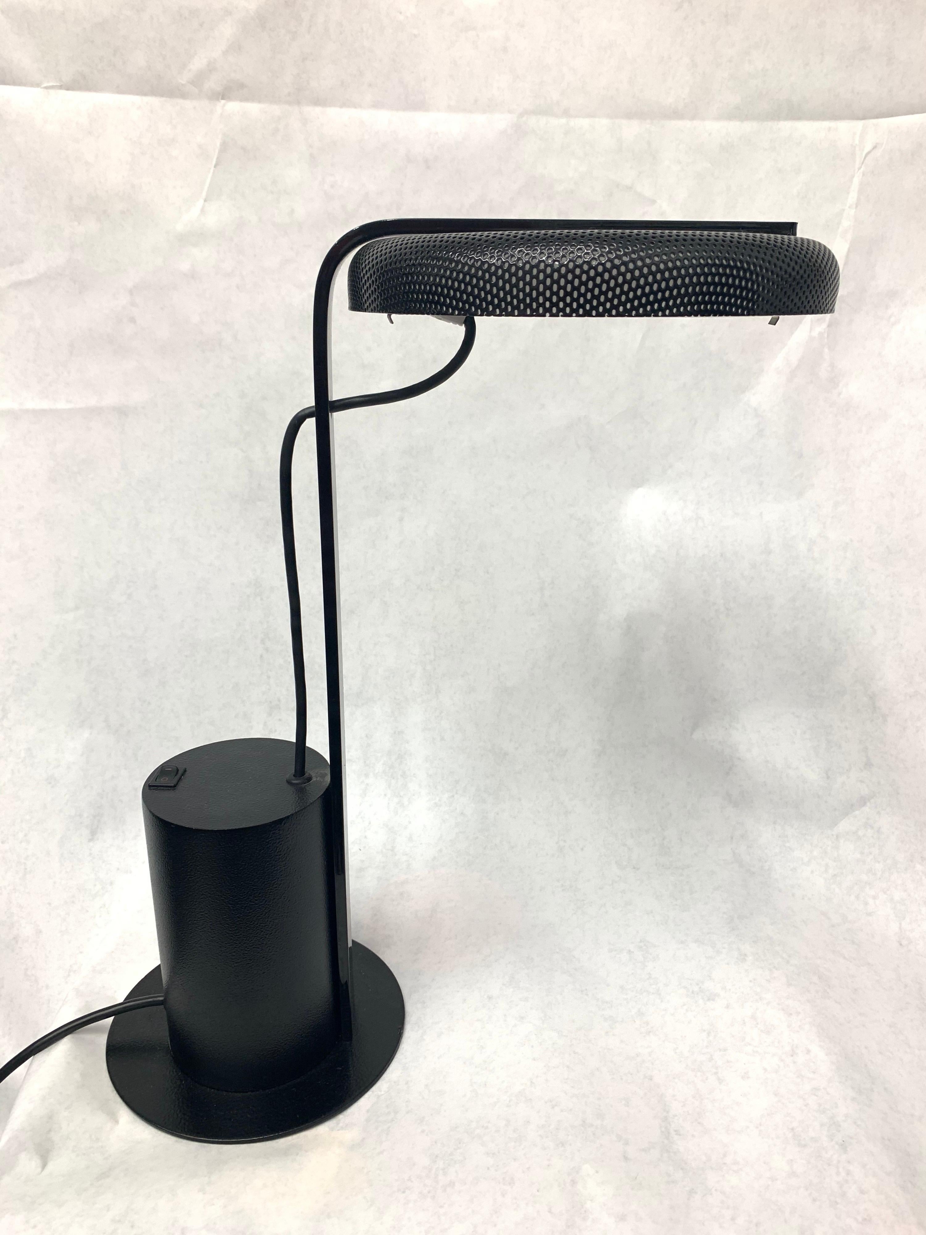 Wonderful and well made Rezek signed desk lamp in all black.
Diameter of mesh perforated diffuser is 9 inches.