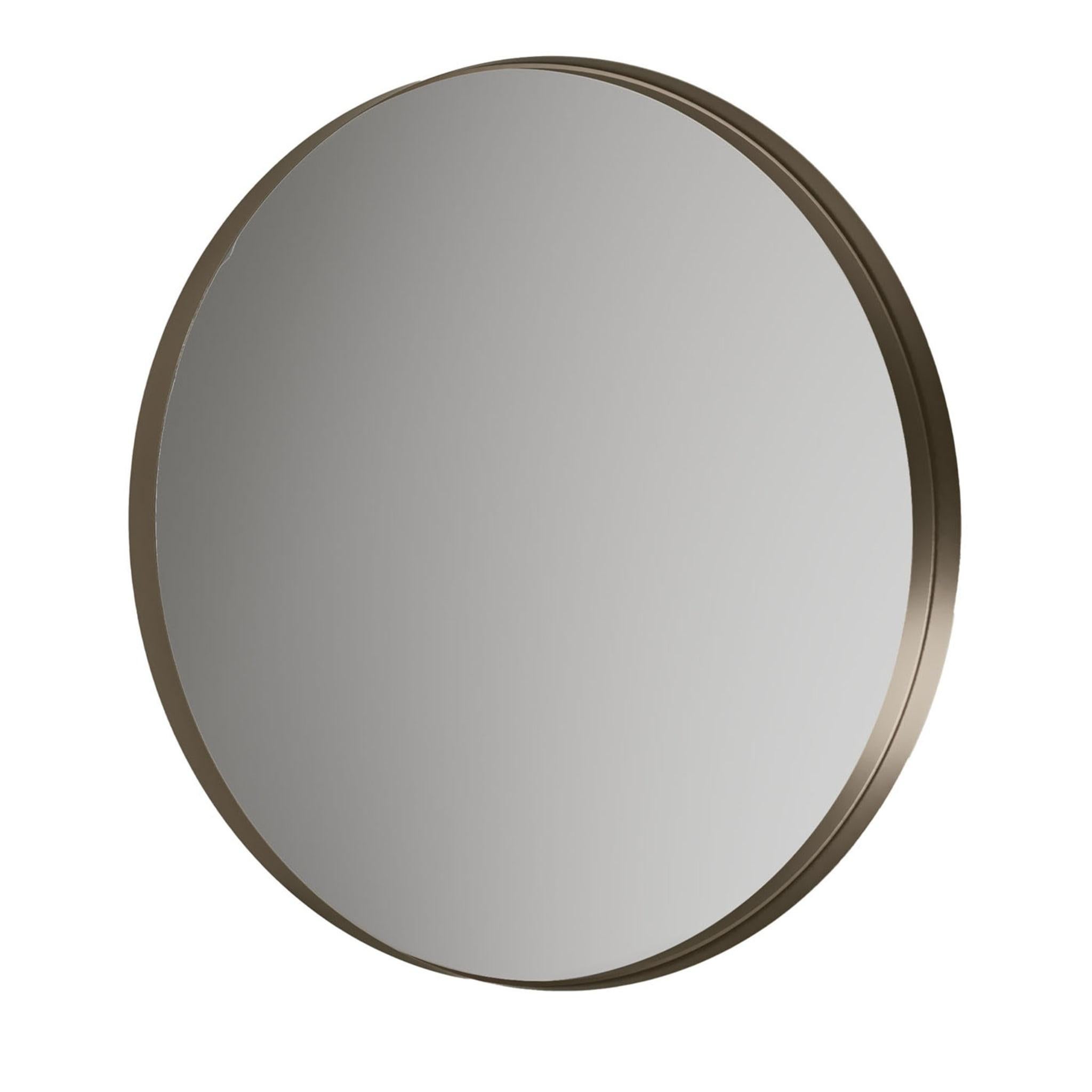 Designed by Norberto Delfinetti, this sleek wall mirror is a study in minimalism. The bare round silhouette is comprised of a titanium-varnished metal frame encasing the high-quality mirrored glass. Best showcased above a entryway console or