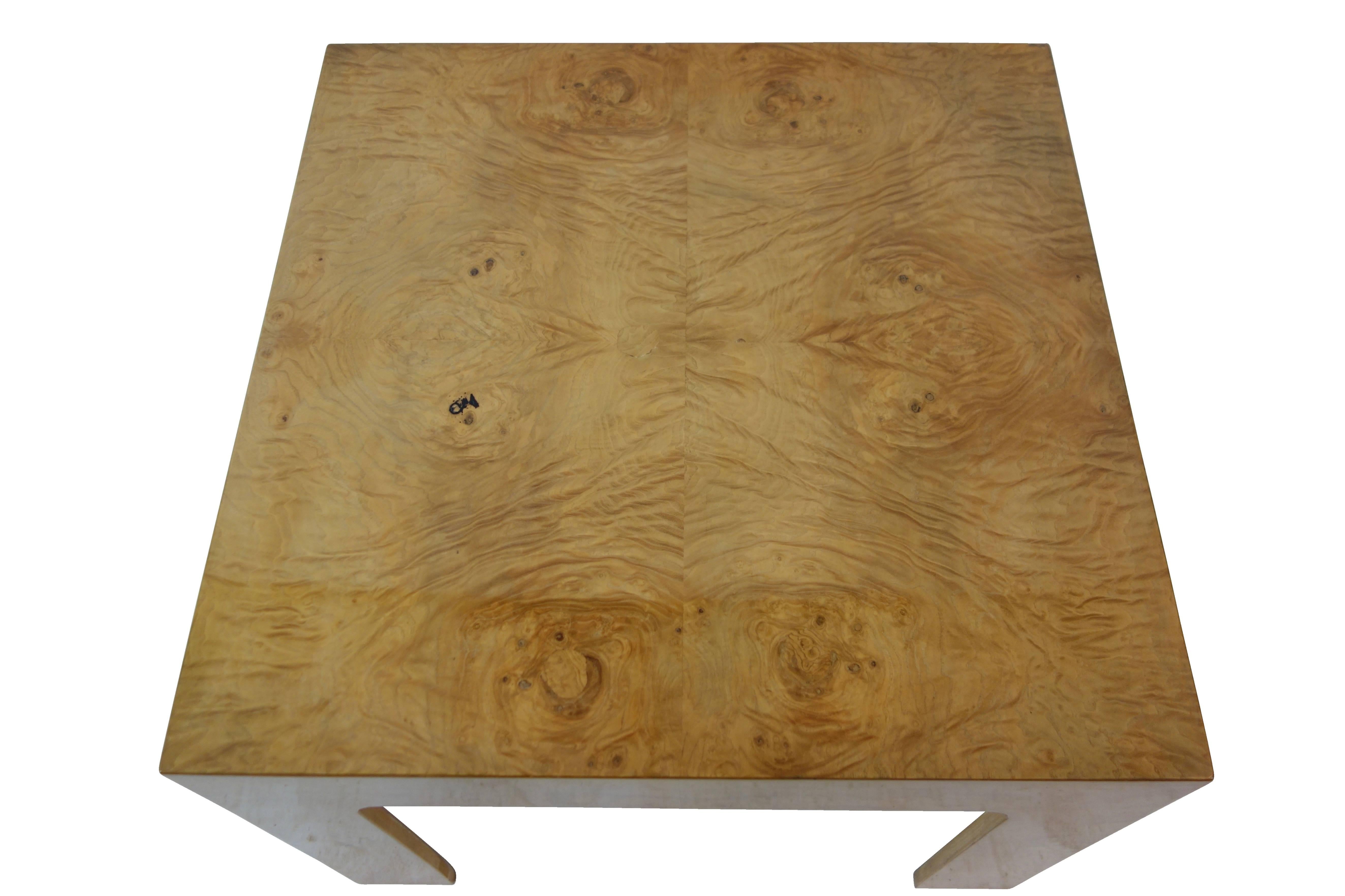 This is a square bookmatched burled Anigre wood side table by Ron Seff, circa 1970.