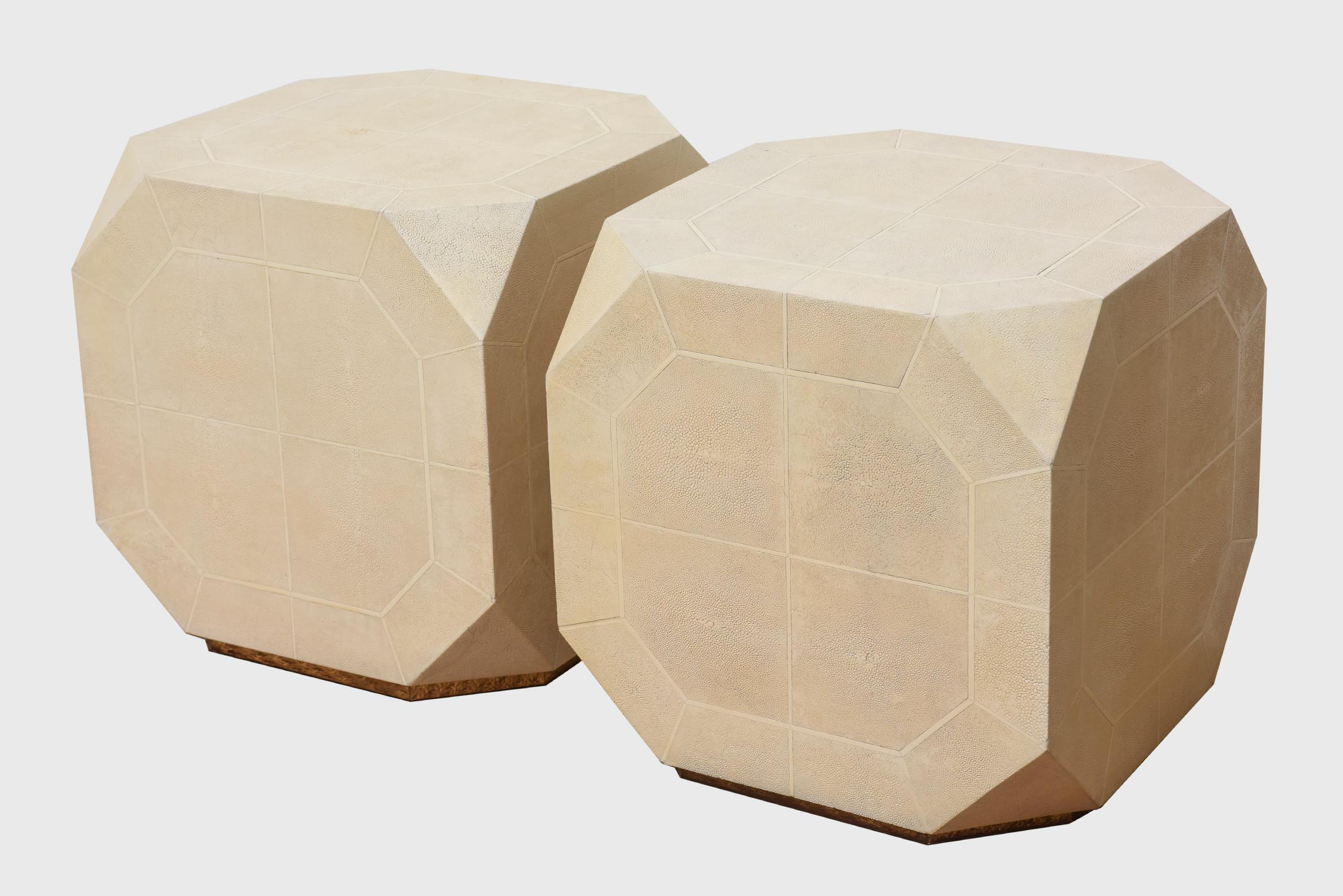 These fabulous dice shaped pair of rare vintage shagreen and bone inlaid side tables are by Ron Seff and are from the late 1970s or early 1980s. They have angled corners. The shagreen is a off white to cream color with variants and has bone inlay