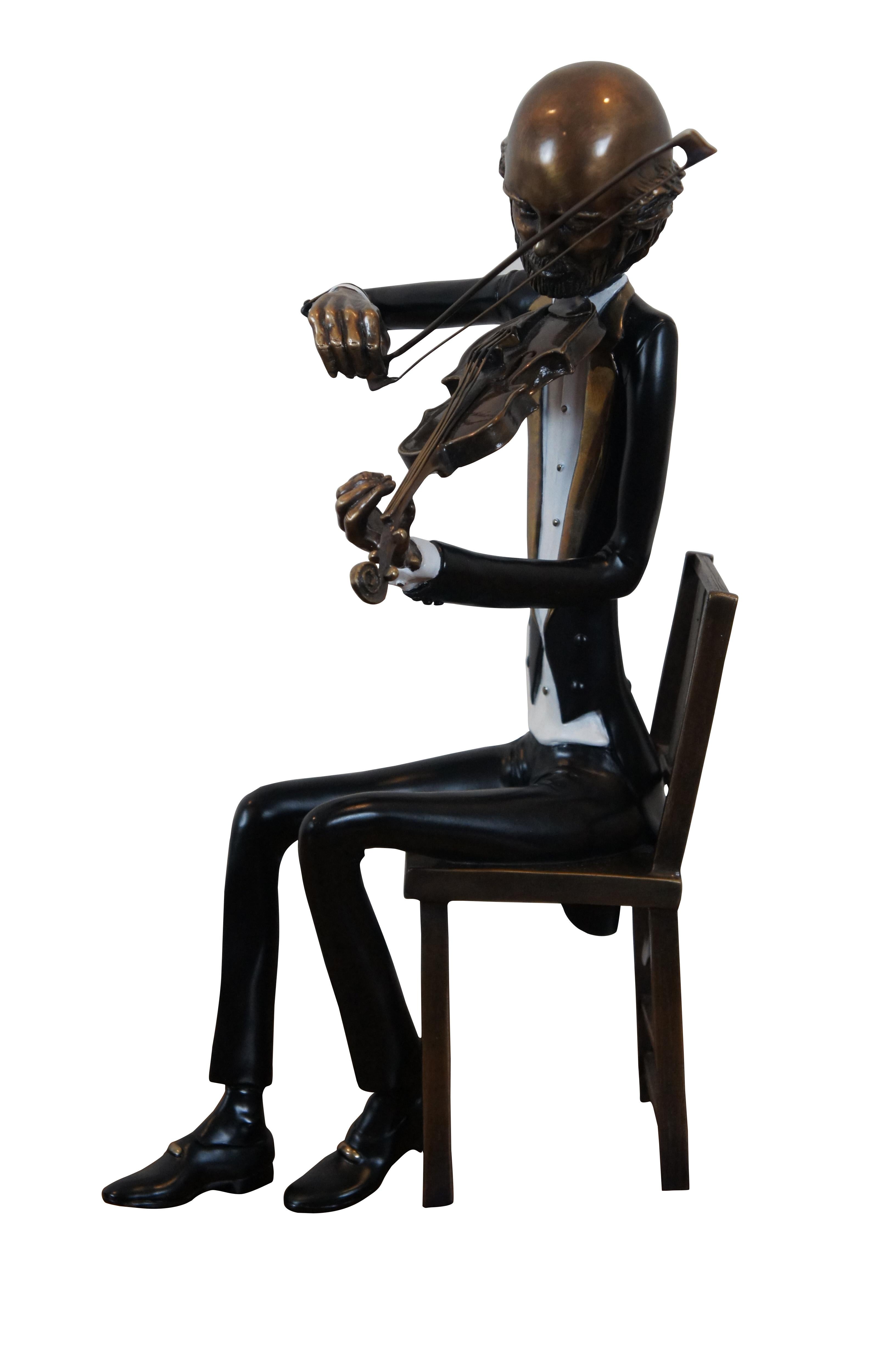 Modernist bronze figurine/statuette titled First Violin from the Symphony Collection by Ron and Sheila Ruiz. Signed and numbered 42/80 on coat tail.
“Both natives of Southern California, when Ron and Sheila married in 1984, they found they shared