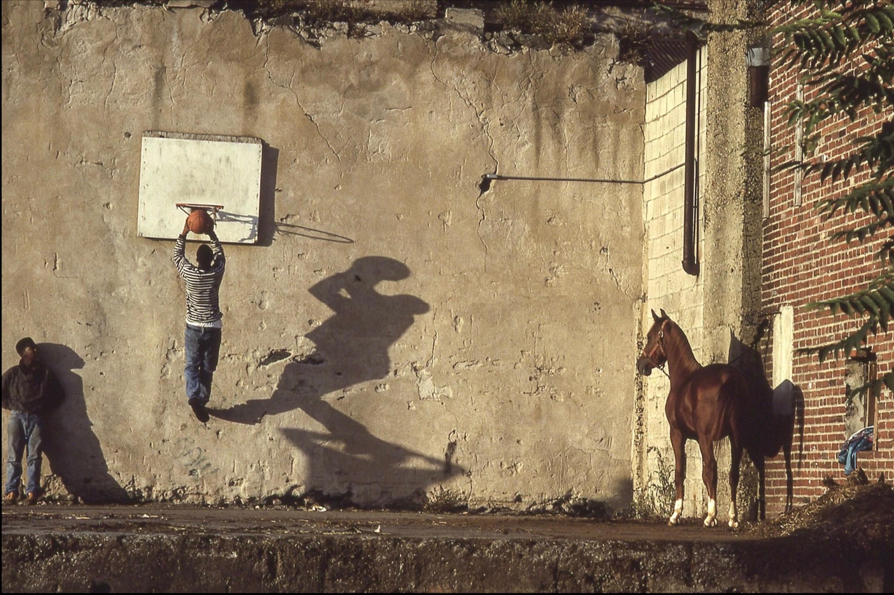 Ron Tarver Color Photograph - The Basketball Game: Black African American urban cowboys in Philadelphia
