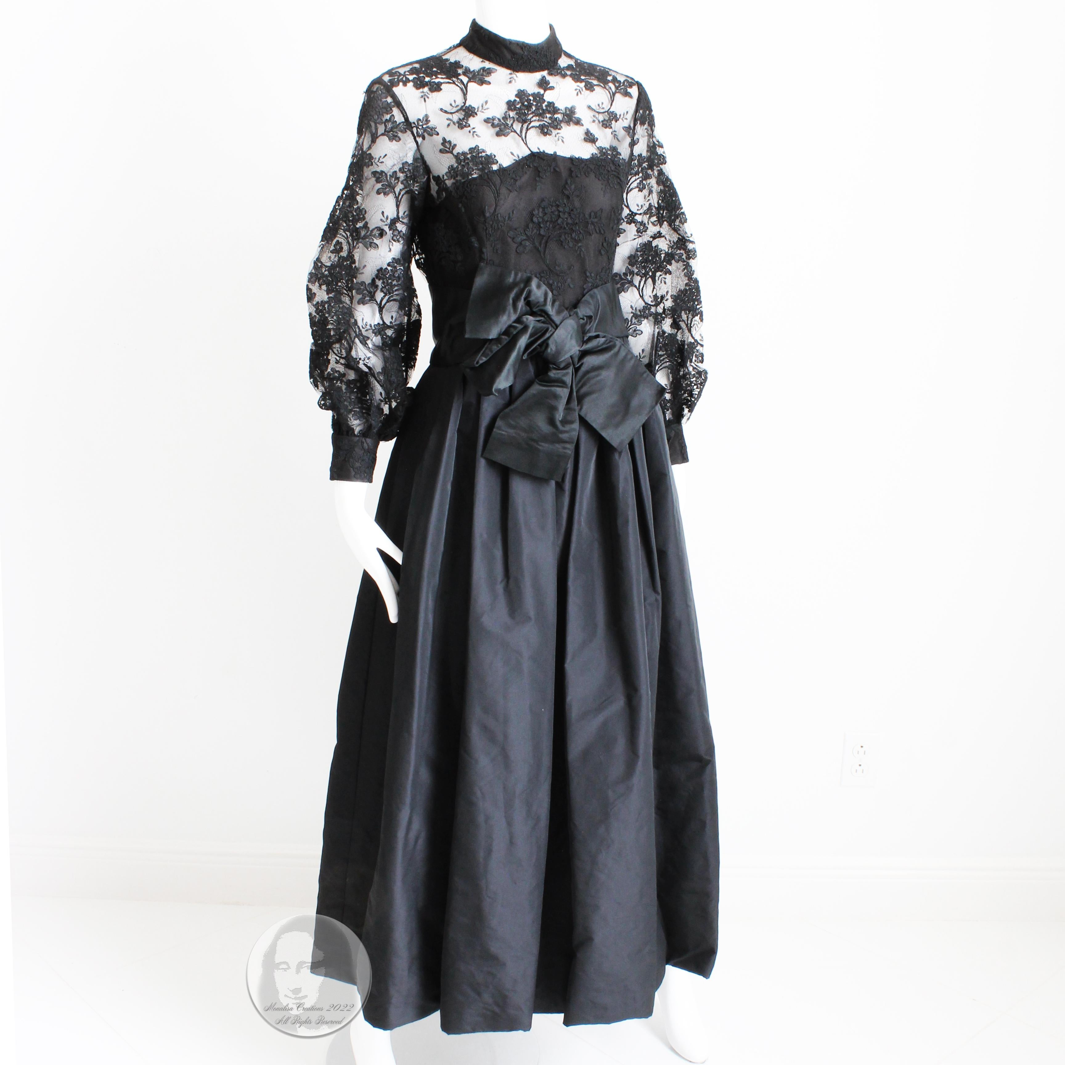 This black lace and taffeta evening gown was made by Ronald Amey in the 1970s and is absolutely gorgeous.  The bodice features black floral lace with netting underneath, and the the darted skirt is made from what appears to be a black silk taffeta