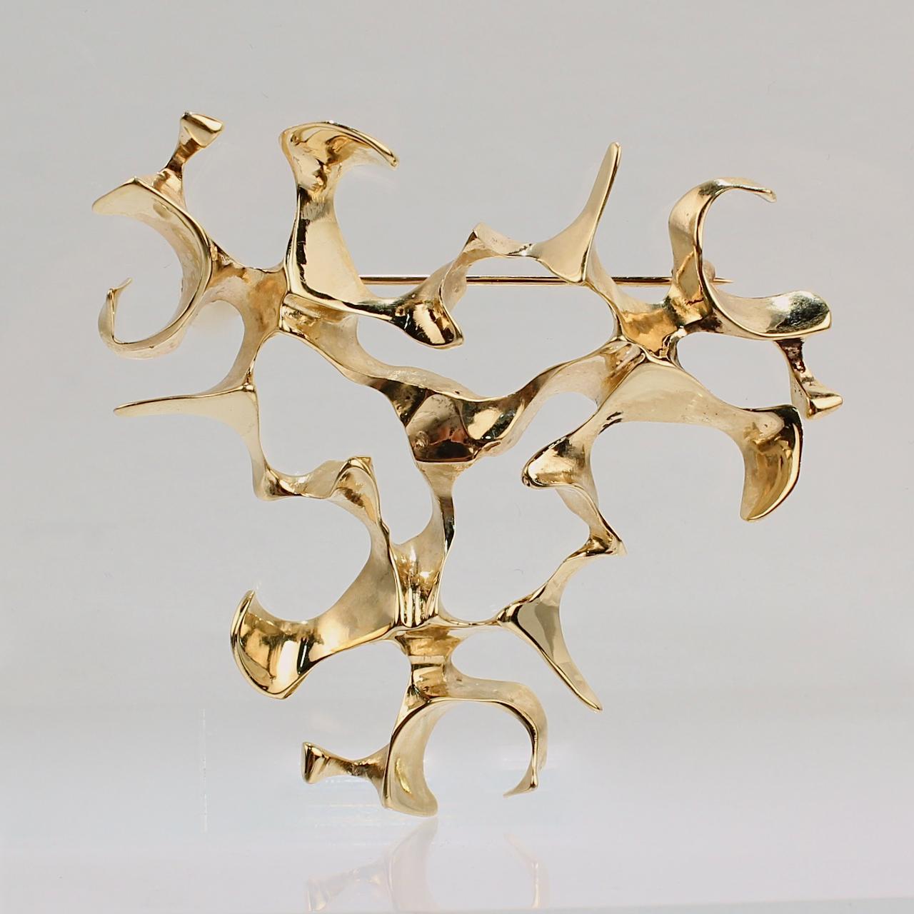 A very fine modernist brooch by Ronald Hayes Pearson. 

In 14k yellow gold.

Ronald Pearson is an extremely important figure in the 20th Century American Craft movement. Together with John Prip and others, Ronald Pearson opened the highly acclaimed