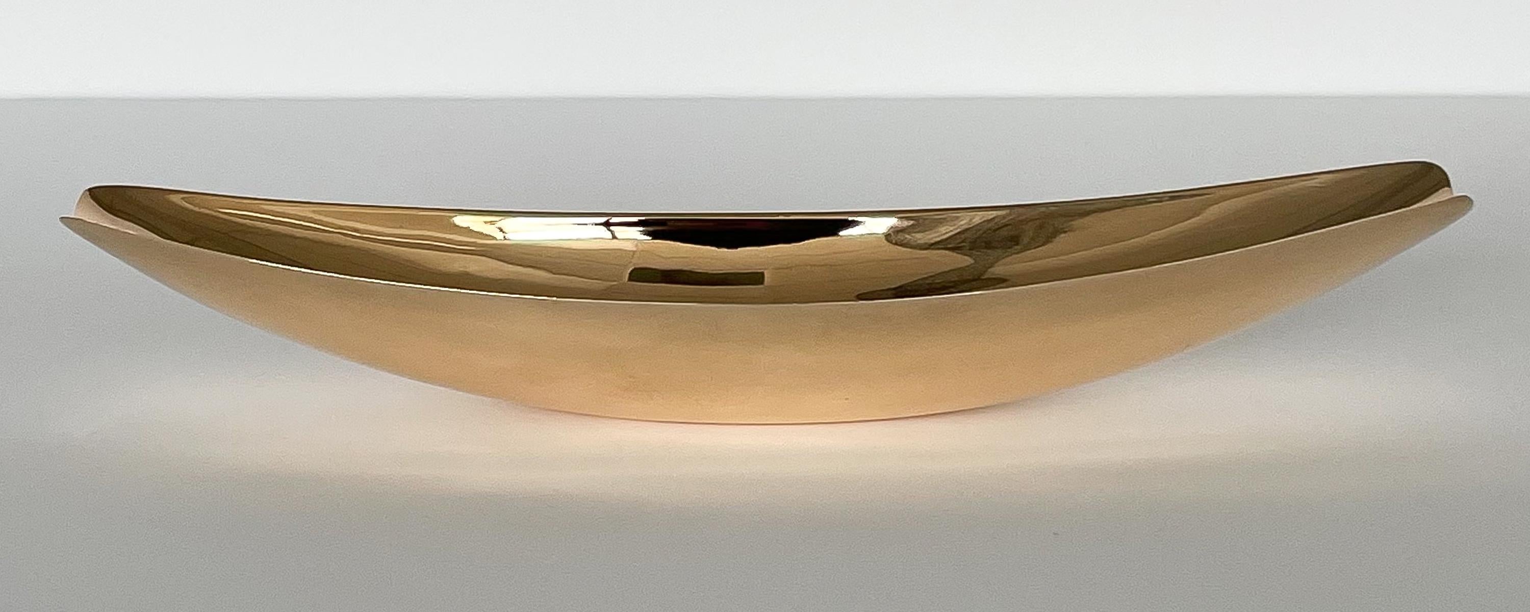 Modernist polished bronze dish by Ronald Hayes Pearson and John Prip for Metal Arts Company, Rochester NY, circa 1950s. Solid polished bronze. Narrow dish with tapered / scooped ends. Marked MA Co. Bronze, Rochester, NY. Measures 2
