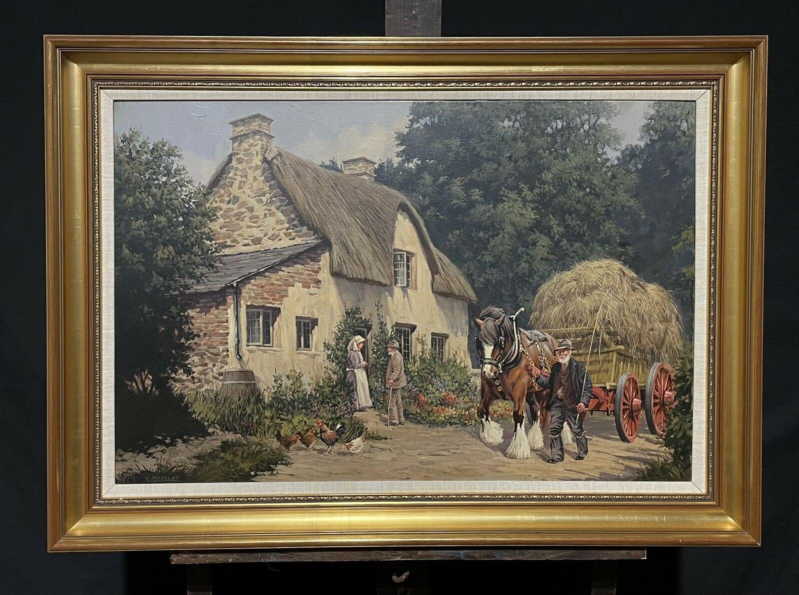 Caballo y carro de heno tradicionales ingleses con granjero charlando en la calle del pueblo - Painting de Ronald Moseley