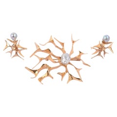 Broche y pendientes modernistas de oro Ronald Pearson