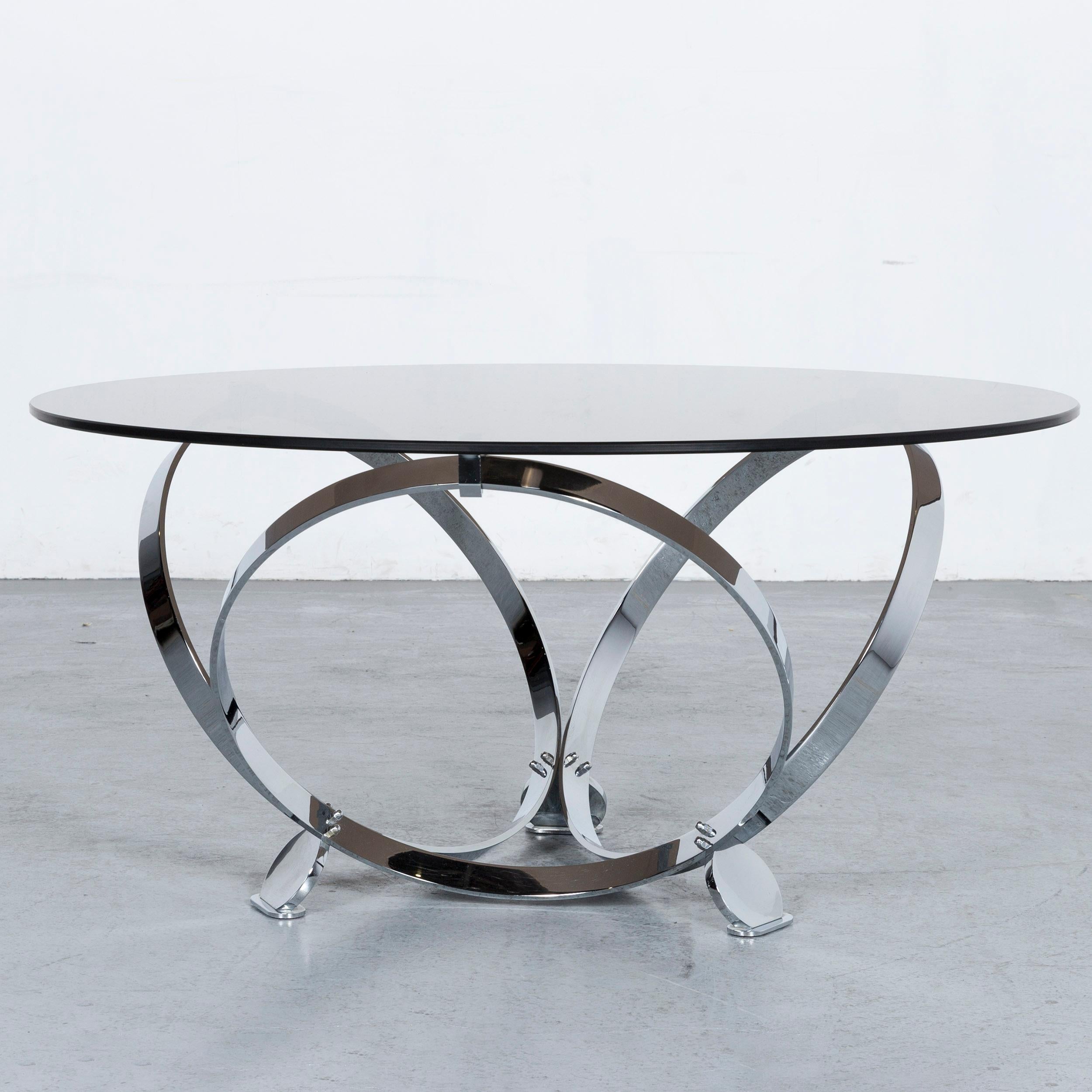 We bring to you a Ronald Schmitt diamond designer glass coffee table silver round.










 