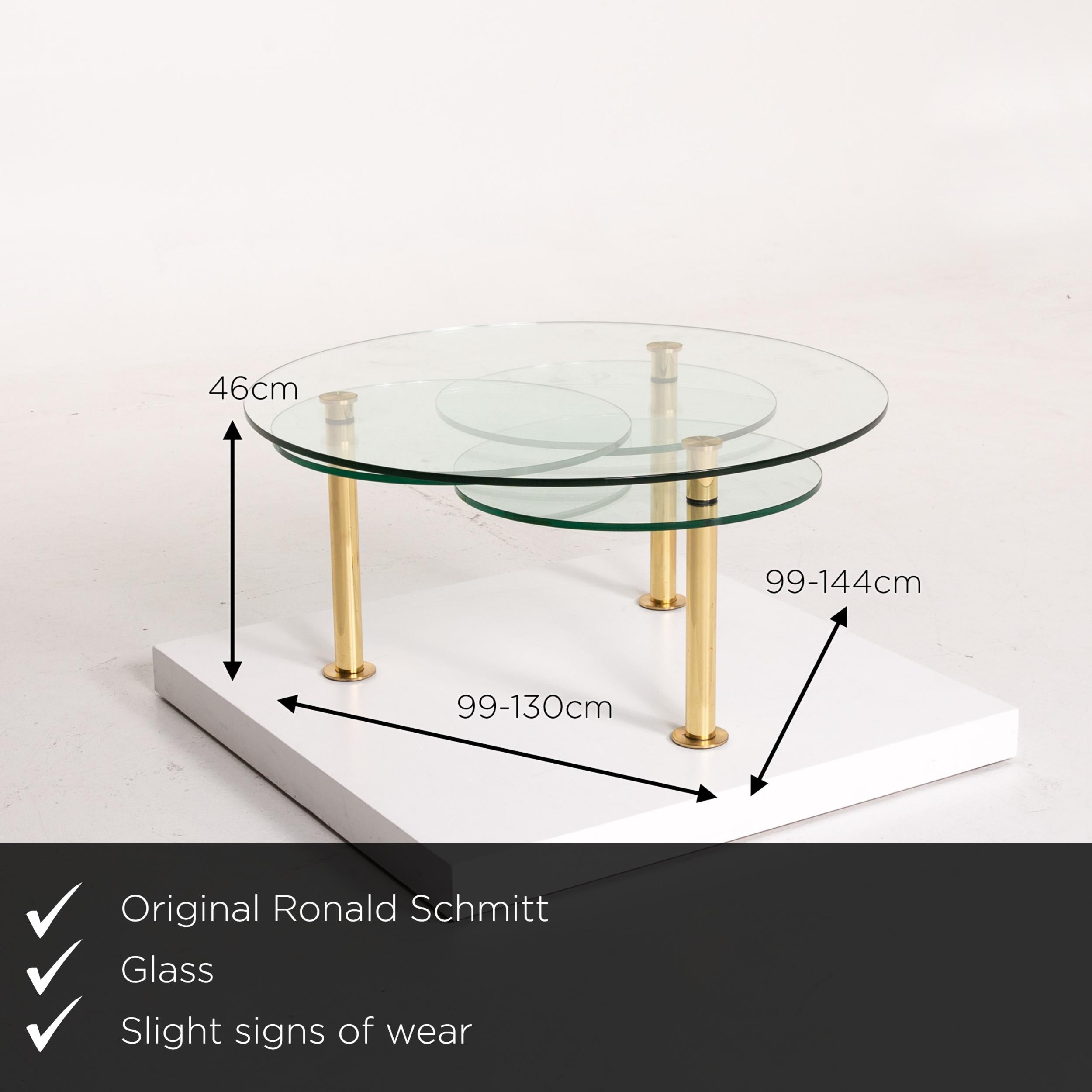 We present to you a Ronald Schmitt glass coffee table gold function adjustable table.



 Product measurements in centimeters:
 

Depth 99
 Width 99
 Height 46.




   