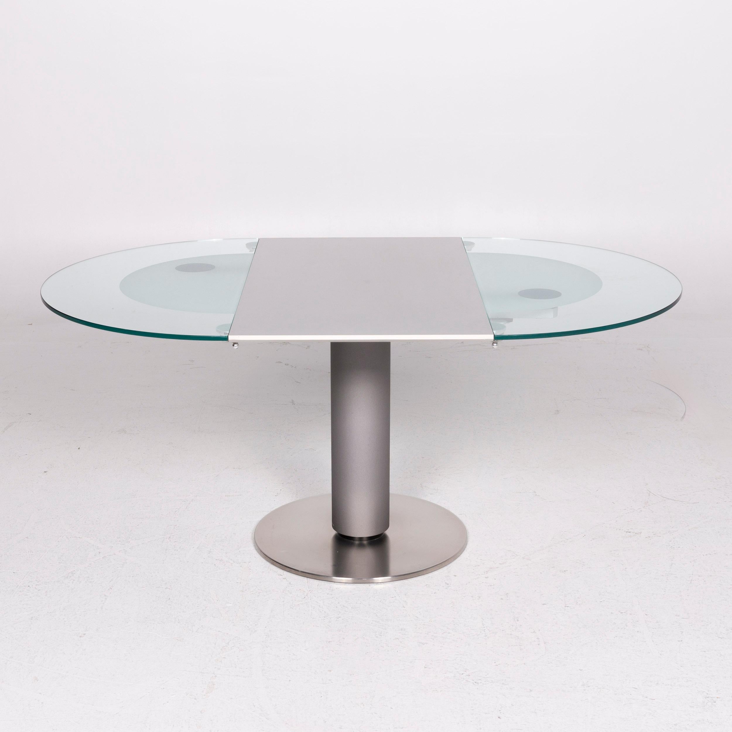 Wir präsentieren Ihnen einen Ronald Schmitt K 765 / E Glastisch silber Esstisch größenverstellbar.

 
 Produktabmessungen in Zentimetern:
 

Tiefe 105
Breite 165
Höhe 76.





 