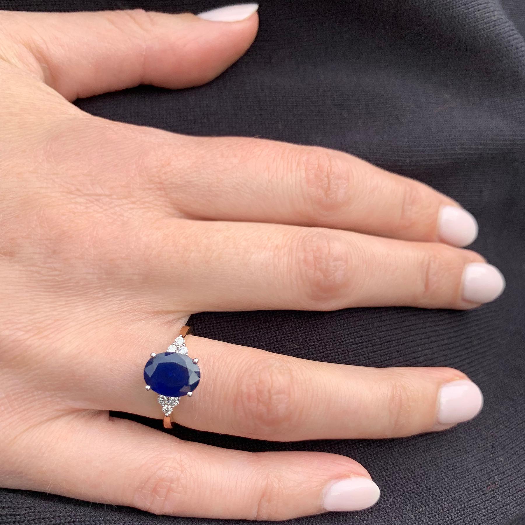 Elegant is the perfect word to describe this sapphire ring. 
A deep blue oval sapphire (3.03ct) is framed on either side by three gorgeous white diamonds (0.16ct) perfect as an engagement ring or a right hand ring.
Ring Size: M 1/2. Band Width: