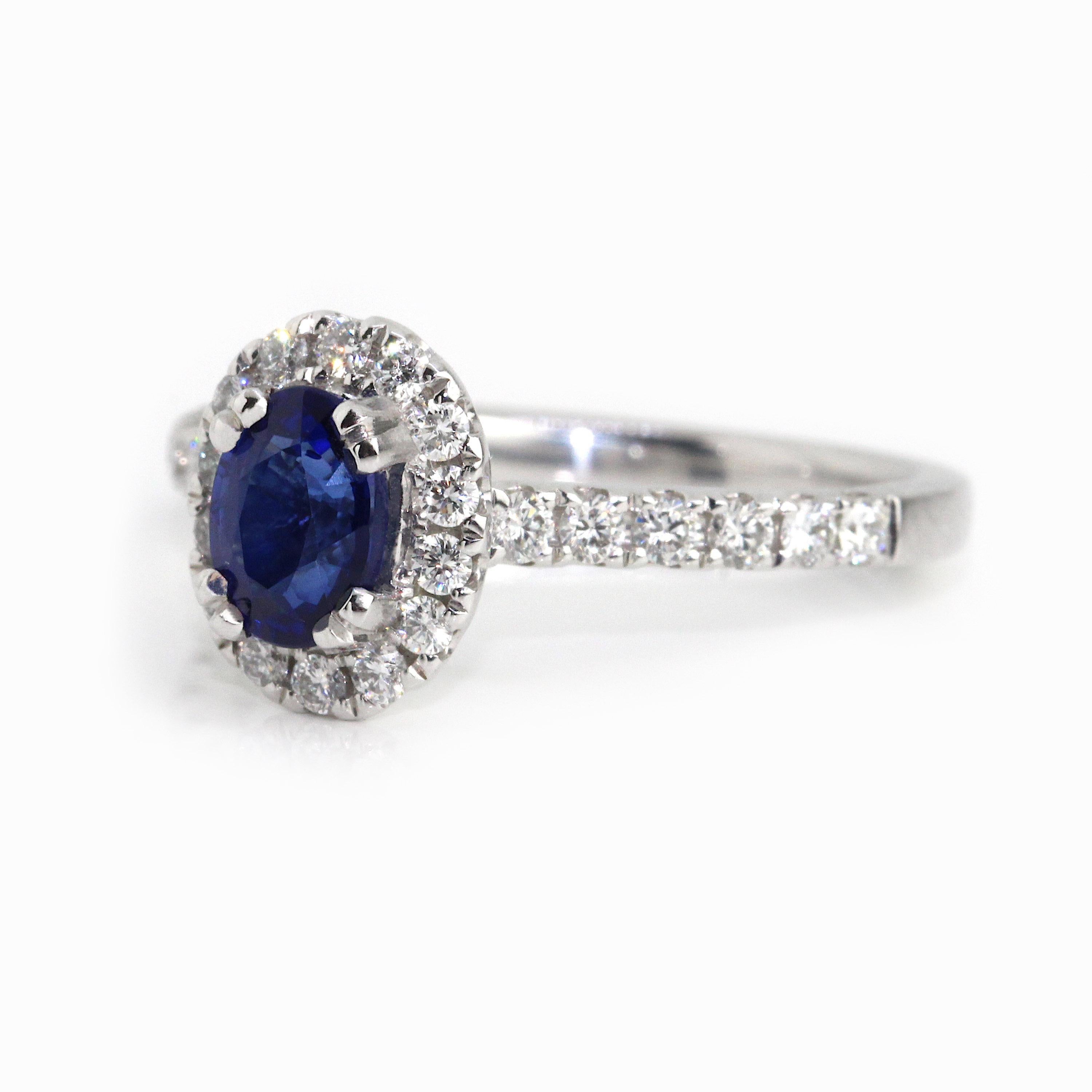 Oval Cut 18 Karat White Gold Sapphire Halo Engagement Ring For Sale