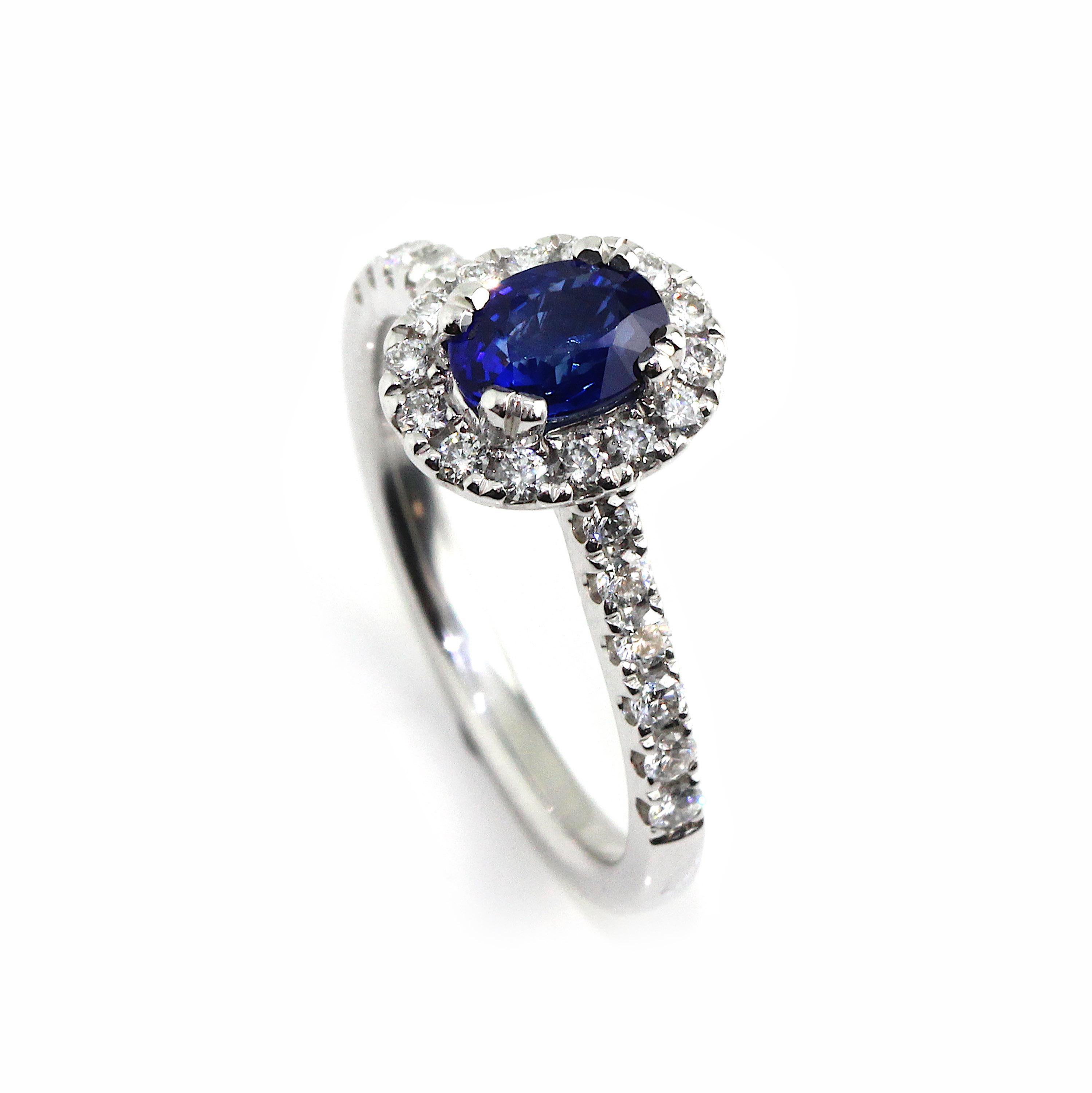 Women's or Men's 18 Karat White Gold Sapphire Halo Engagement Ring For Sale