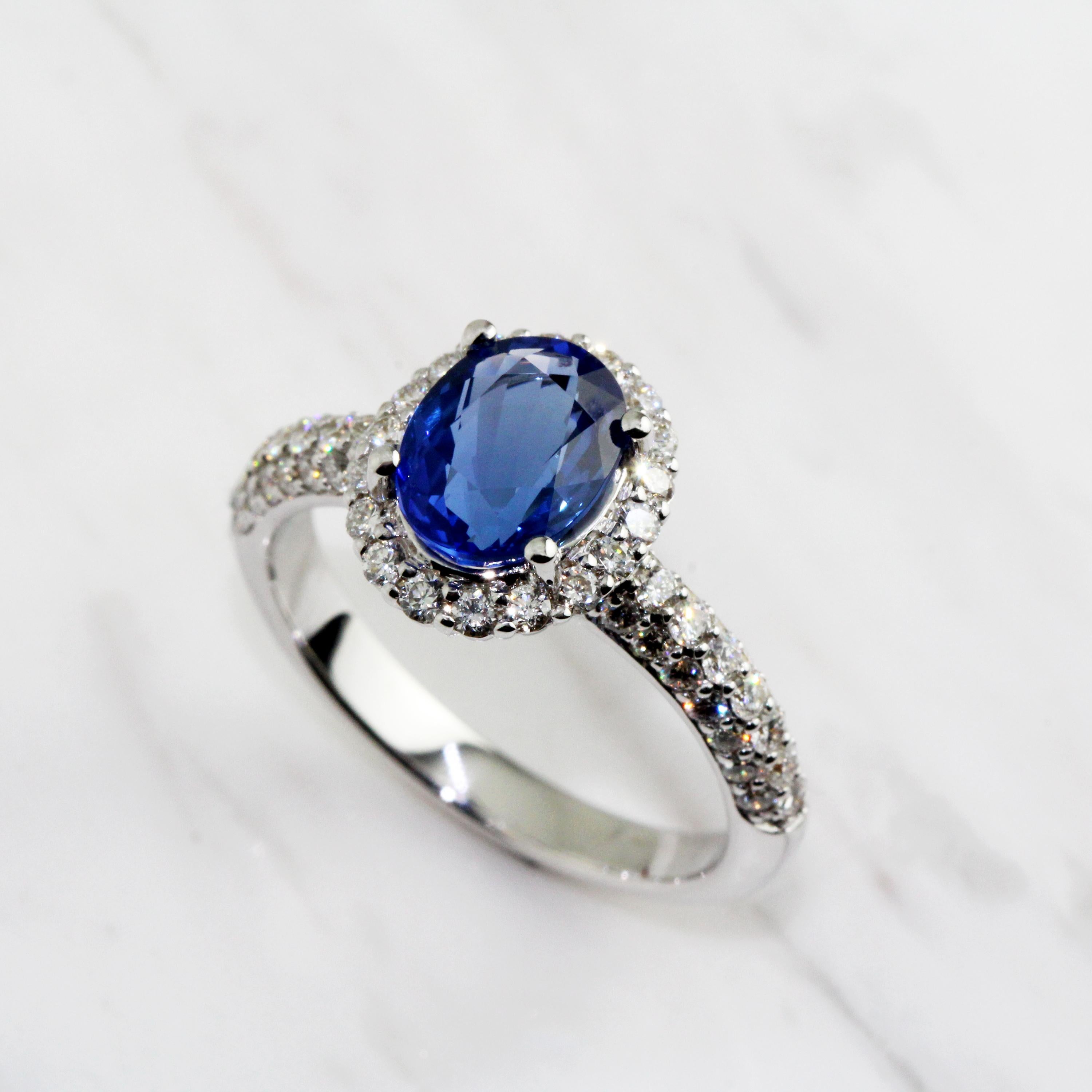 Contemporary Oval Blue Sapphire Diamond Engagement Ring For Sale