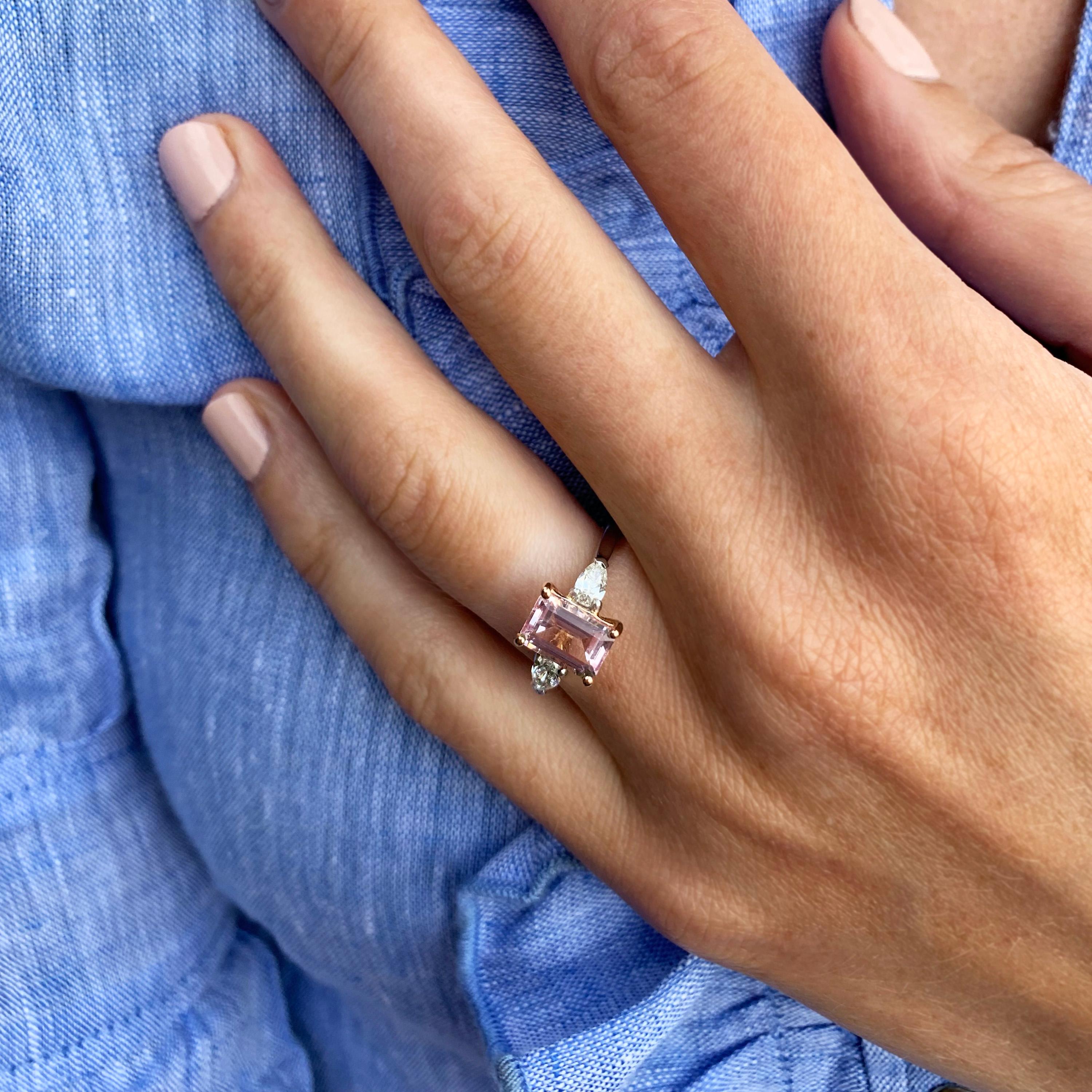 Elegant light pink morganite set in 18k rose gold and platinum. A perfect engagement ring or right hand ring. Contrasting shapes make this beautifully crafted morganite (1.28ct) and pear diamond (0.37ct E VS1) a real beauty. Light pink married with