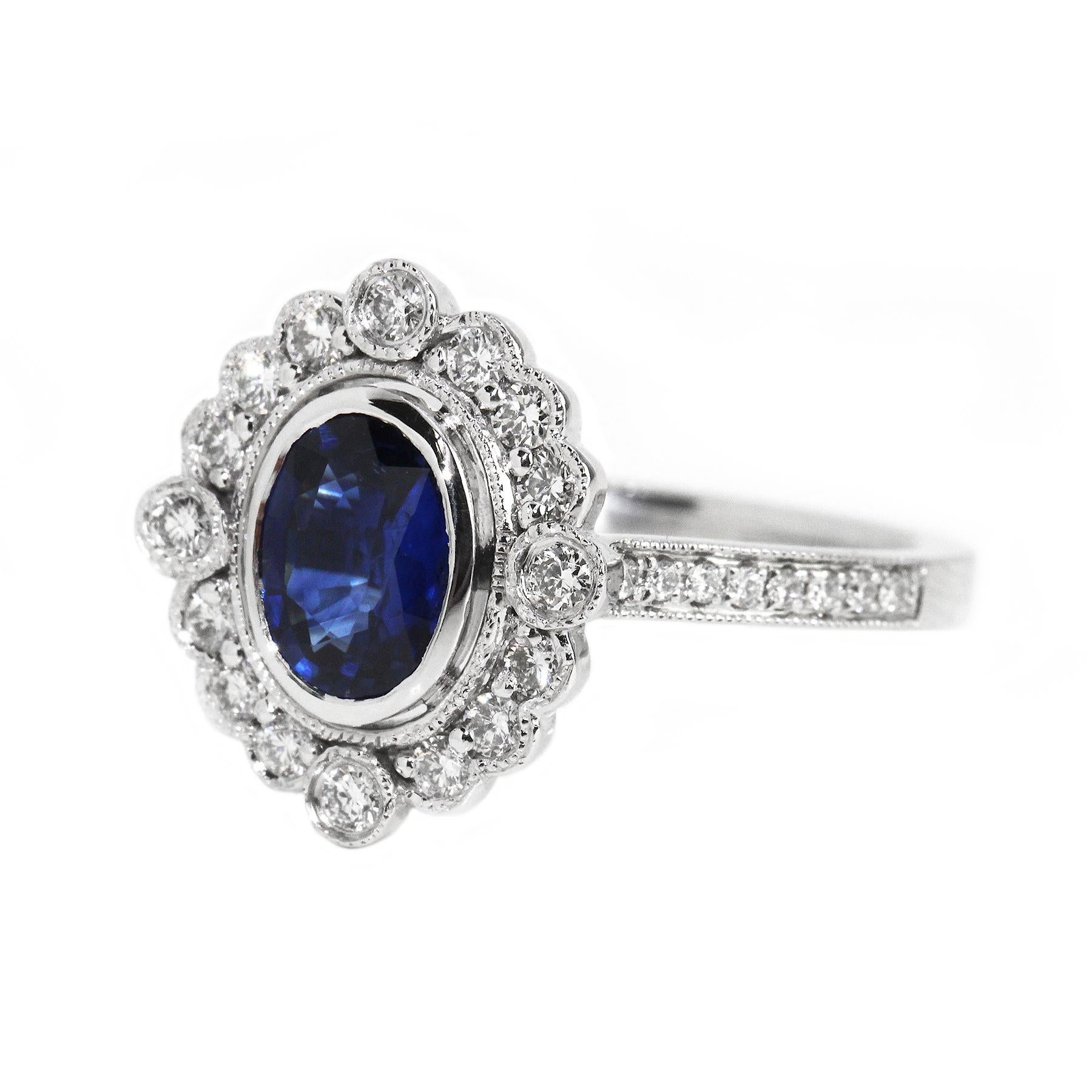 Oval Cut Sapphire and Diamond Vintage Inspired Engagement Ring For Sale