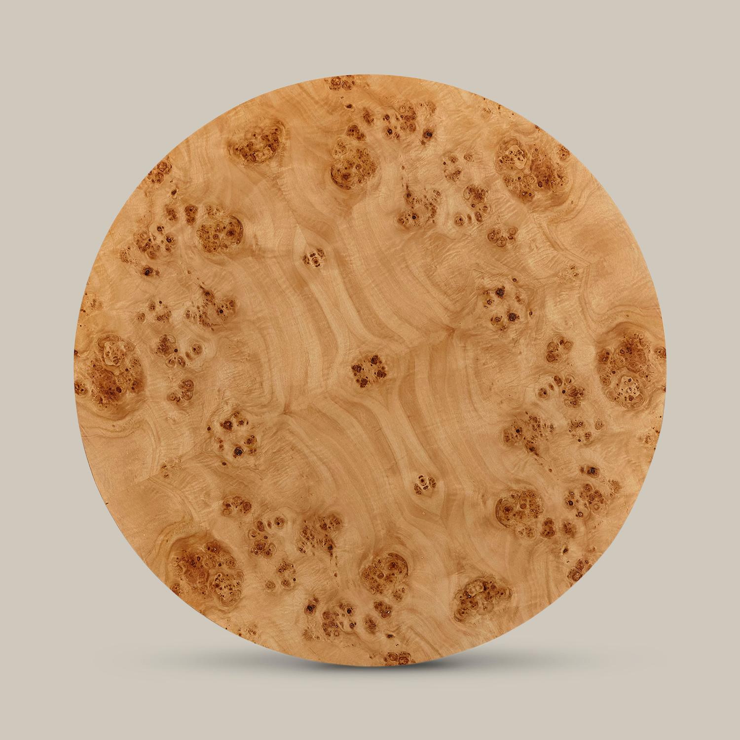 As one of our best sellers, the Rondel Bunching cocktail table provides a modern twist on a classic natural material. Two cylindrical forms make an artful, bunching cocktail table and celebrate the natural Mappa burl wood for a functional addition