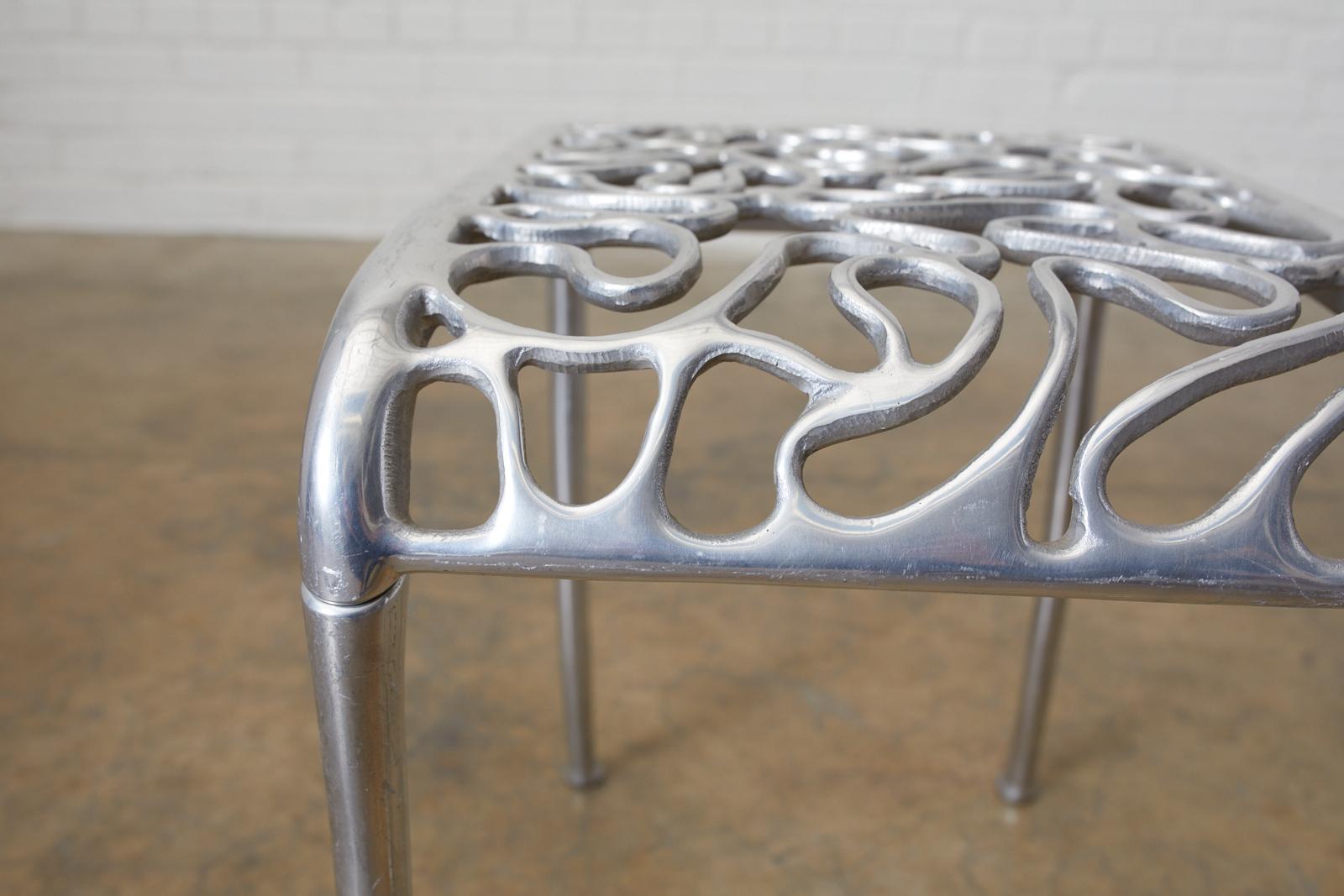 Rondel Design Cast Aluminum Peanut Foot Stool 2