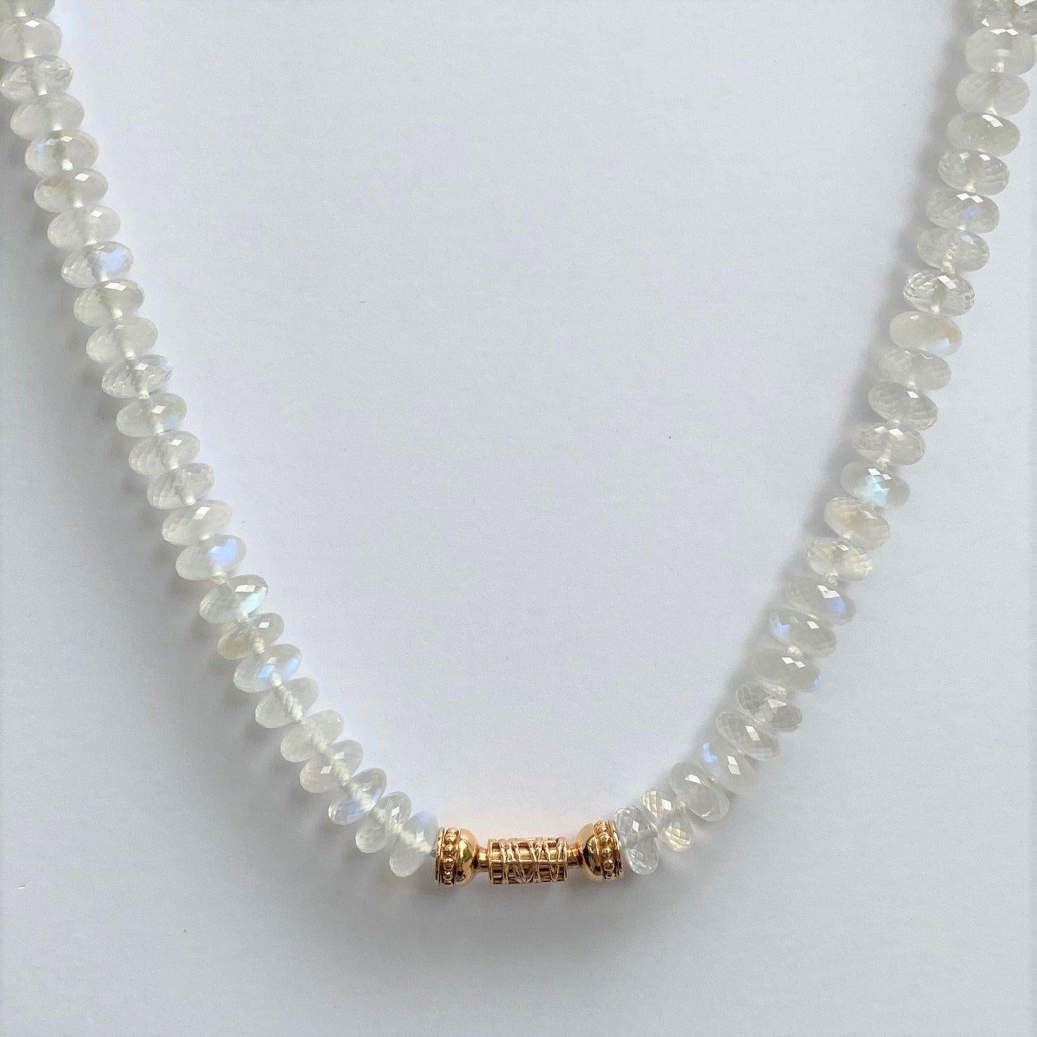 A 17  inch faceted moonstone modullyn strand with 158 carats of moonstone and 18k rose gold ends with a 13.1mm Tahitian maki-e pearl clasp with 24k gold enamel and 18k white gold nittle parts. Includes an 18k rose gold webbed clasp enabling the
