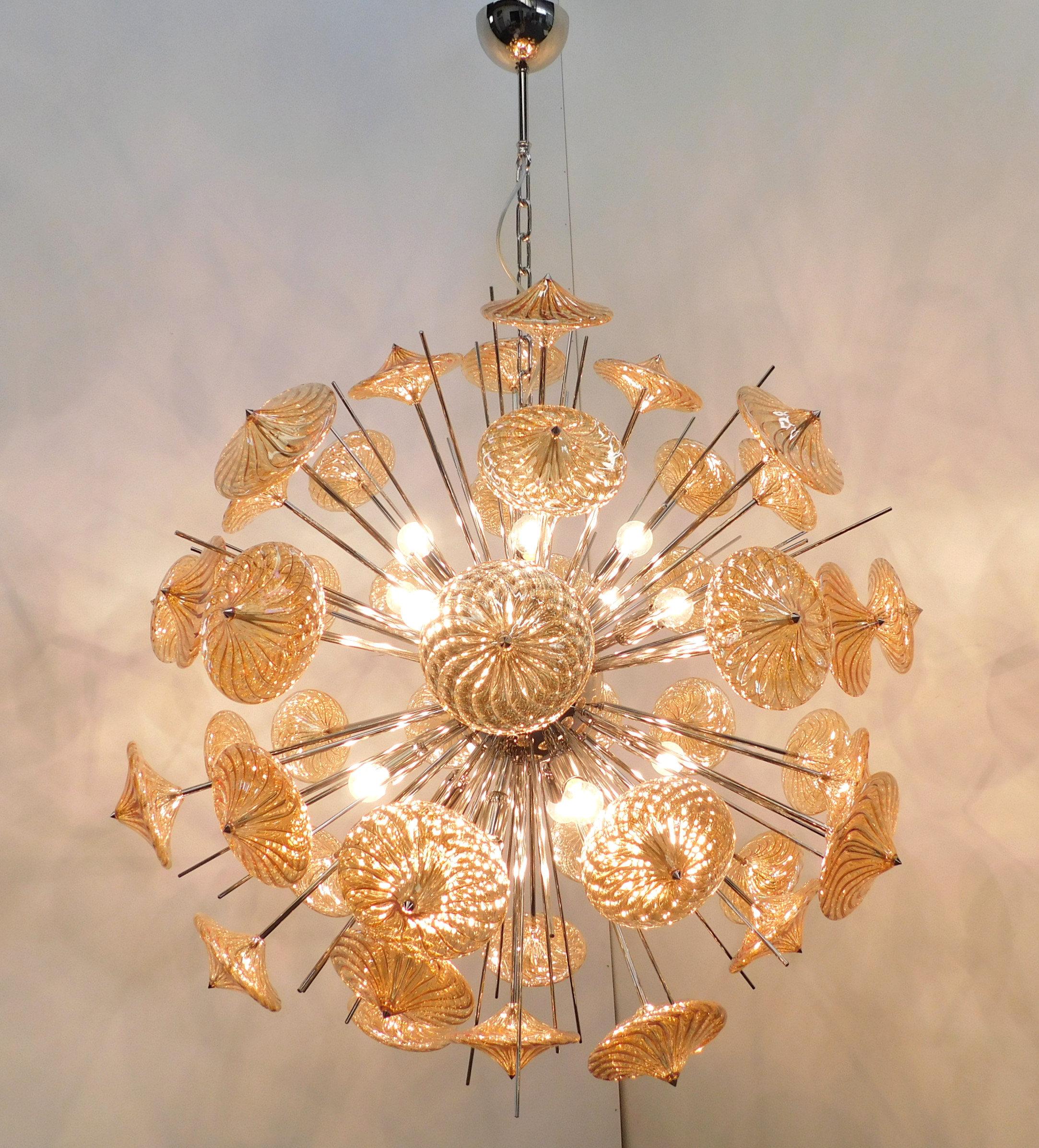 Italian modern Sputnik chandelier with amber Pyrex borosilicate glasses hand blown to produce a spiraled effect, mounted on polished nickel frame / Designed by Fabio Bergomi for Fabio Ltd / Made in Italy
16 lights / E26 or E27 type / max 60W